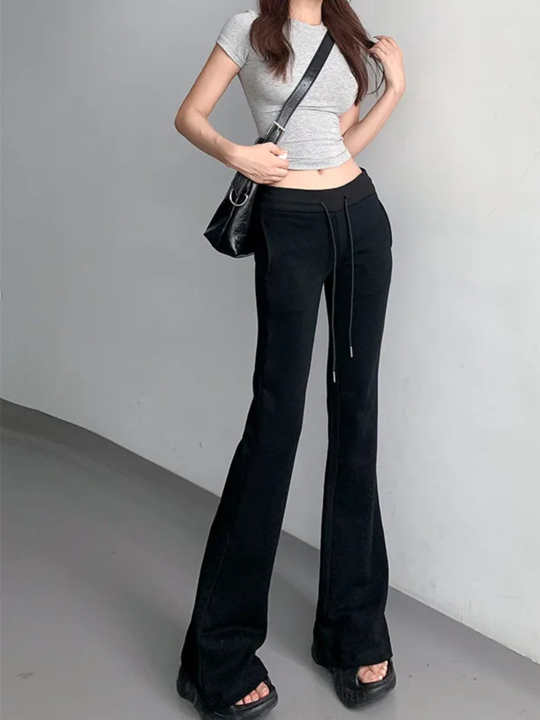black low rise flared sweatpants