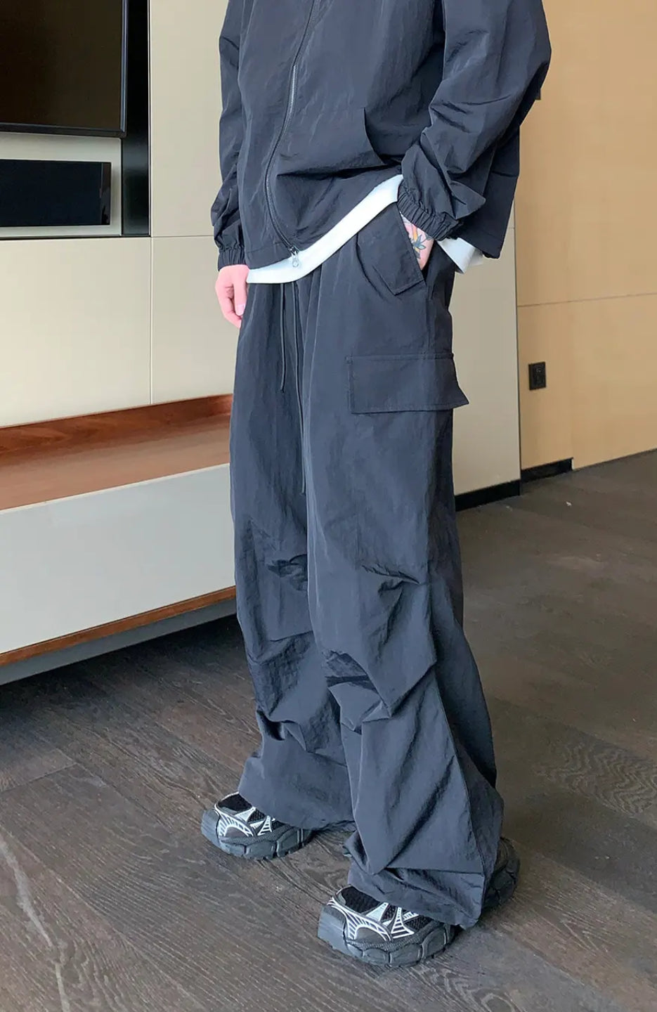 Black Grenade Cargo Pant with multiple pockets and loose fit