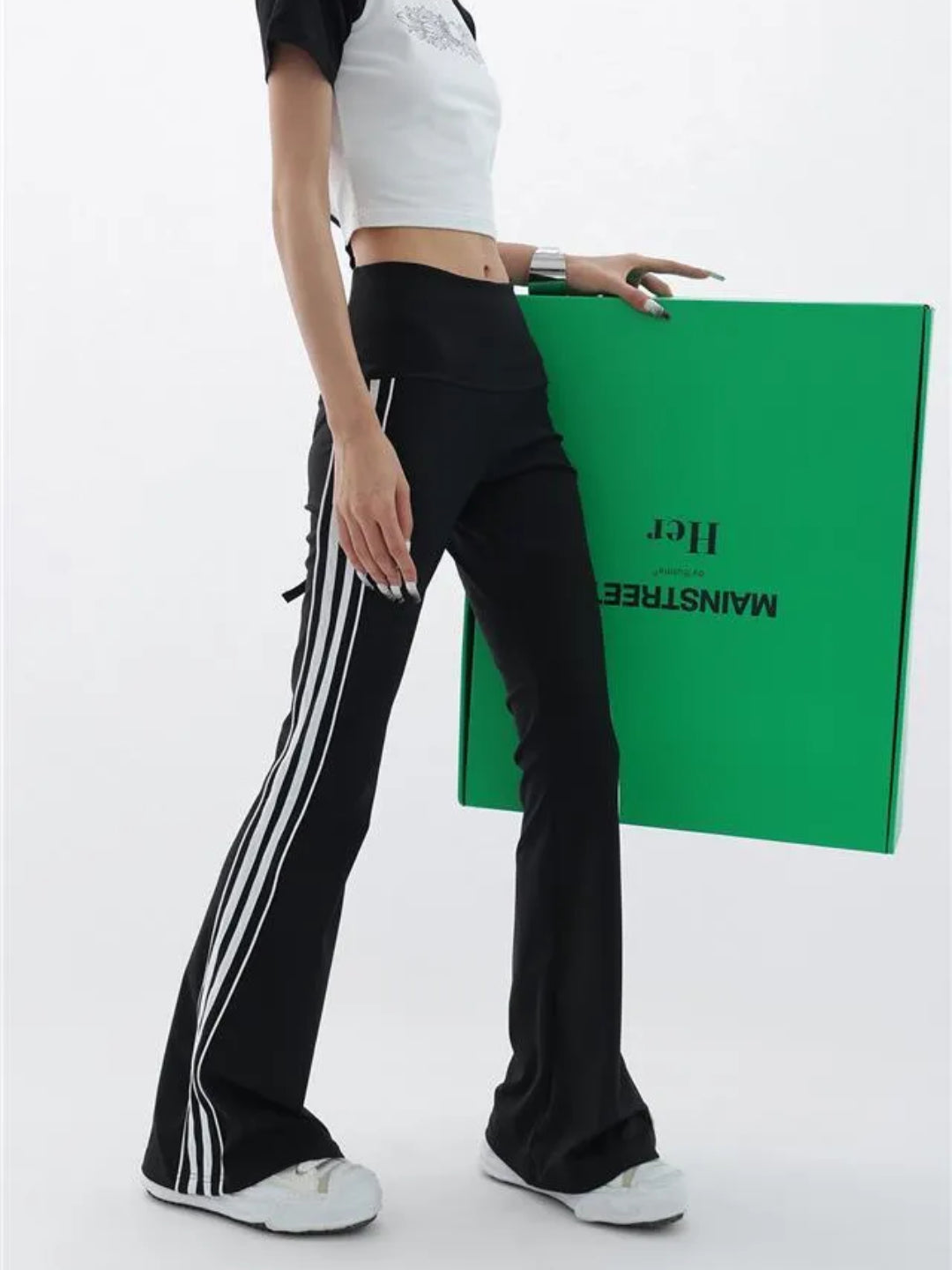 black flare leggings with white stripes on the side