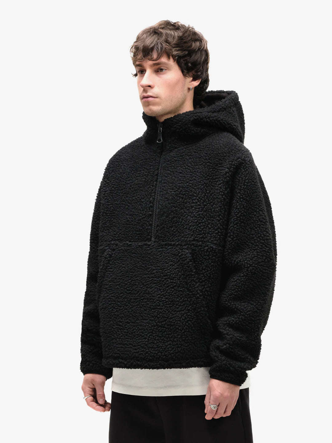 black fleece half-zip hoodie with a kangaroo pocket