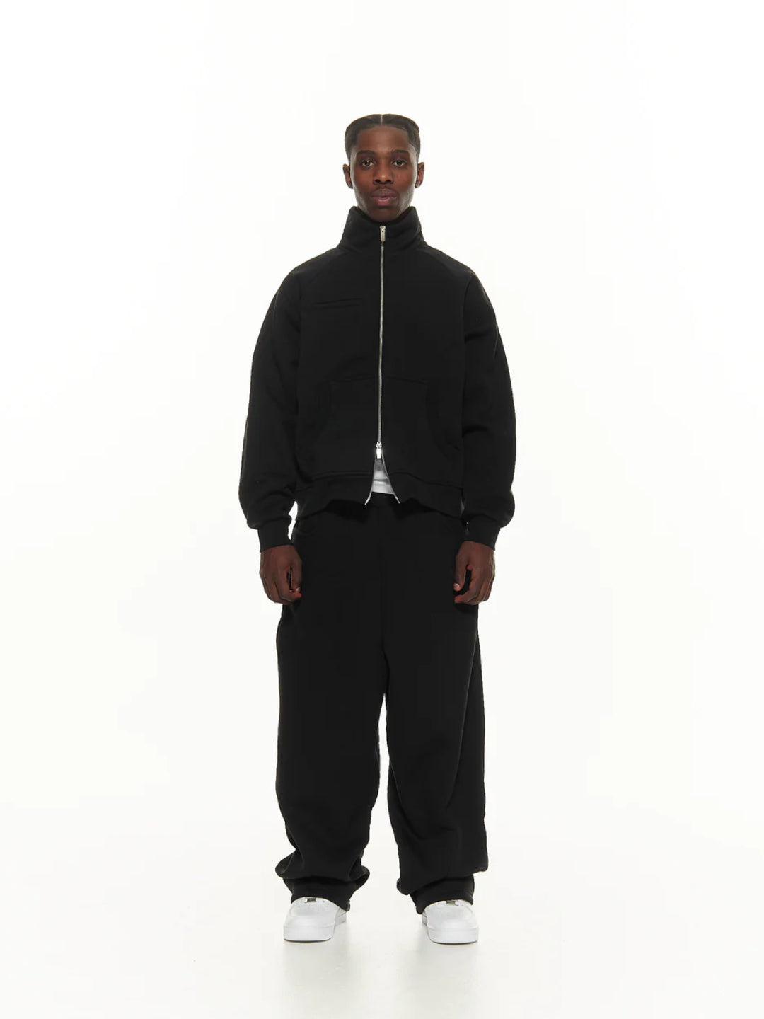 Black tracksuit with a hoodie and pants.