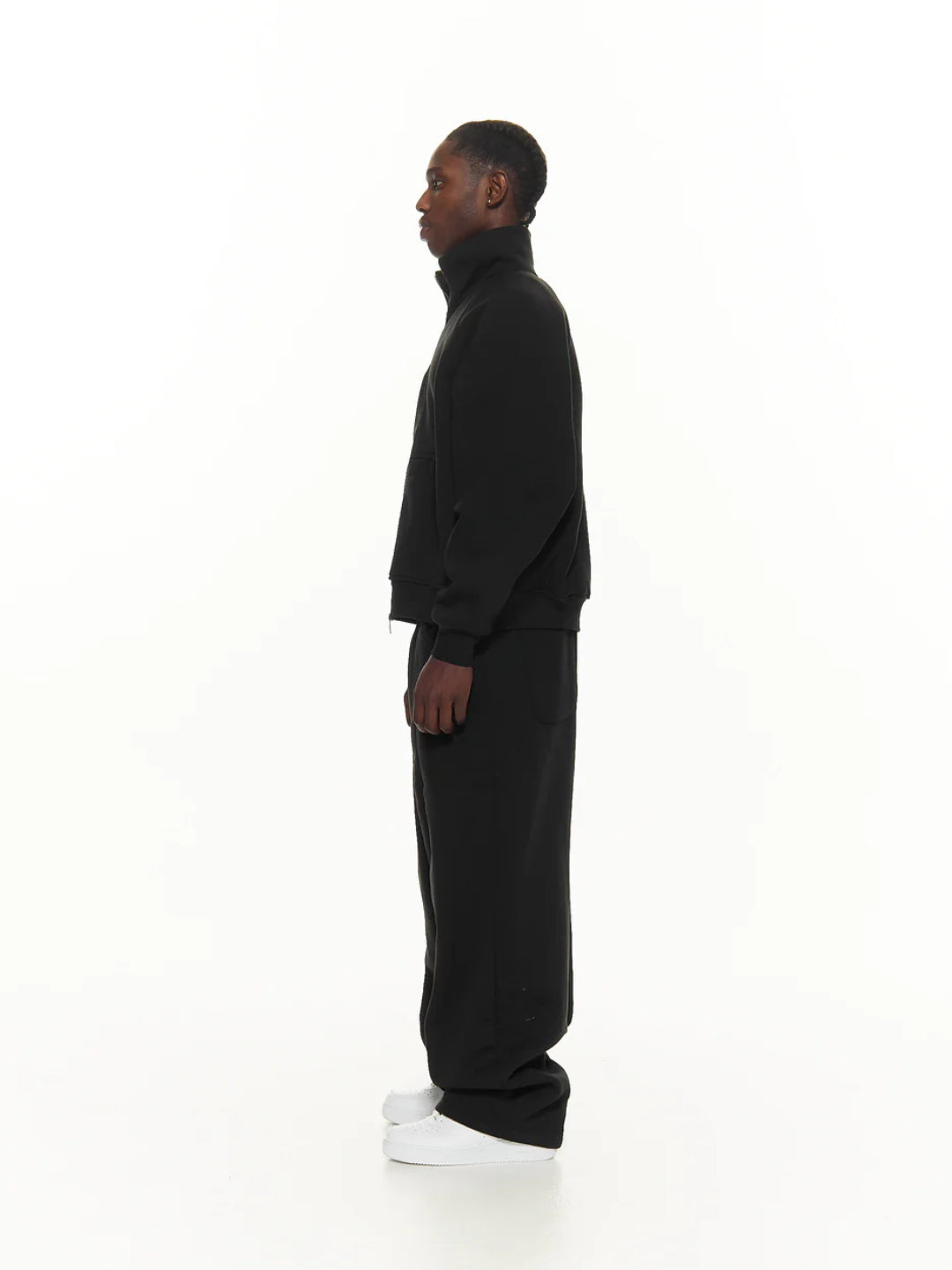 Black tracksuit with a hoodie and pants.