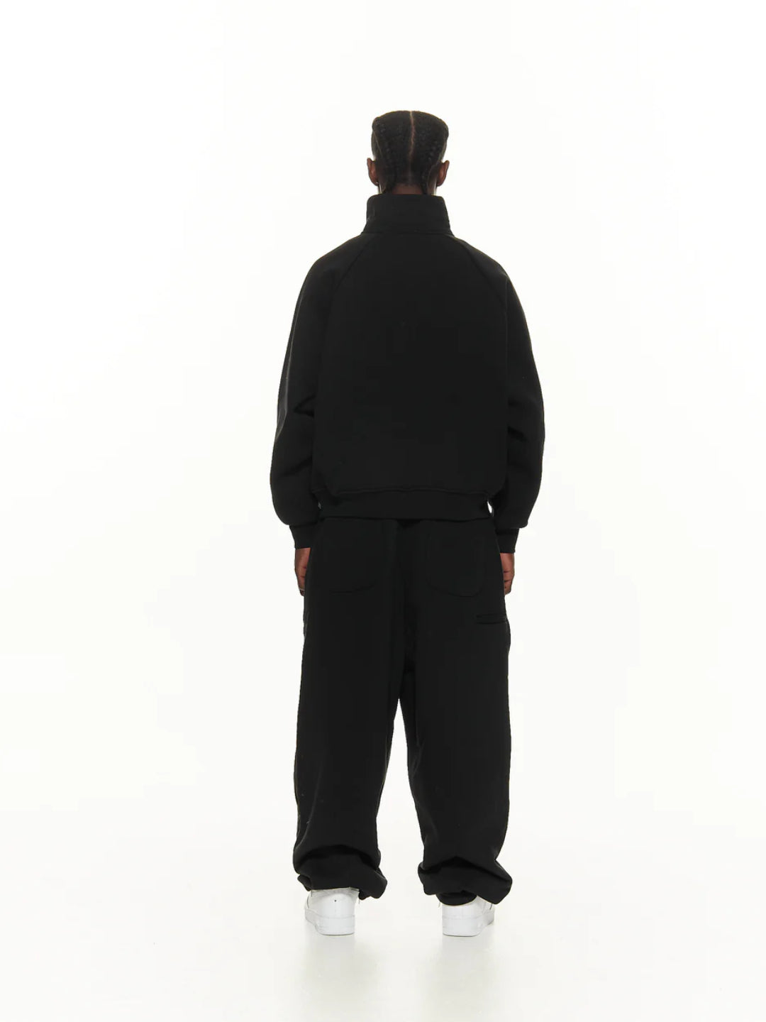 Black tracksuit with a hoodie and pants.