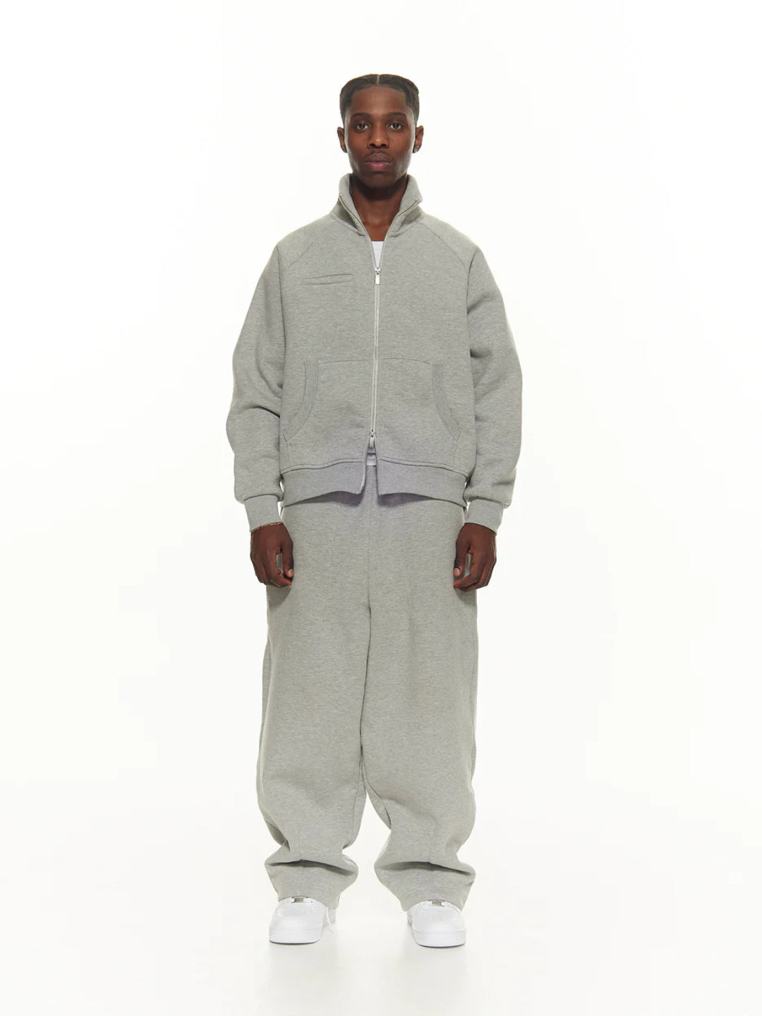 Grey tracksuit with a hoodie and pants.