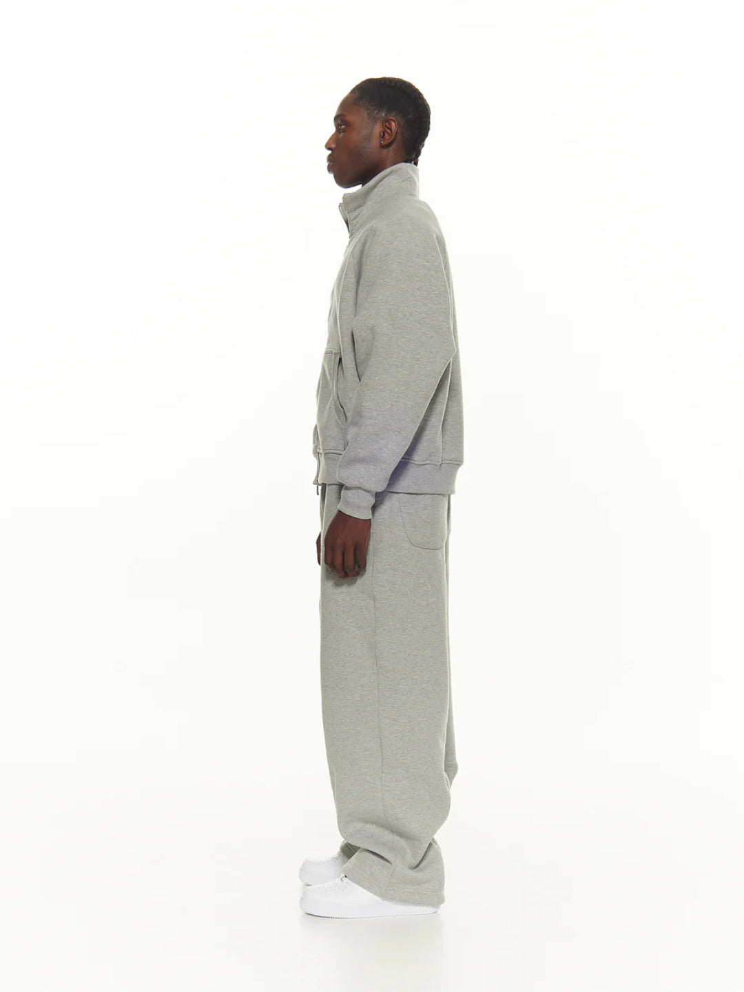 Grey tracksuit with a hoodie and pants.