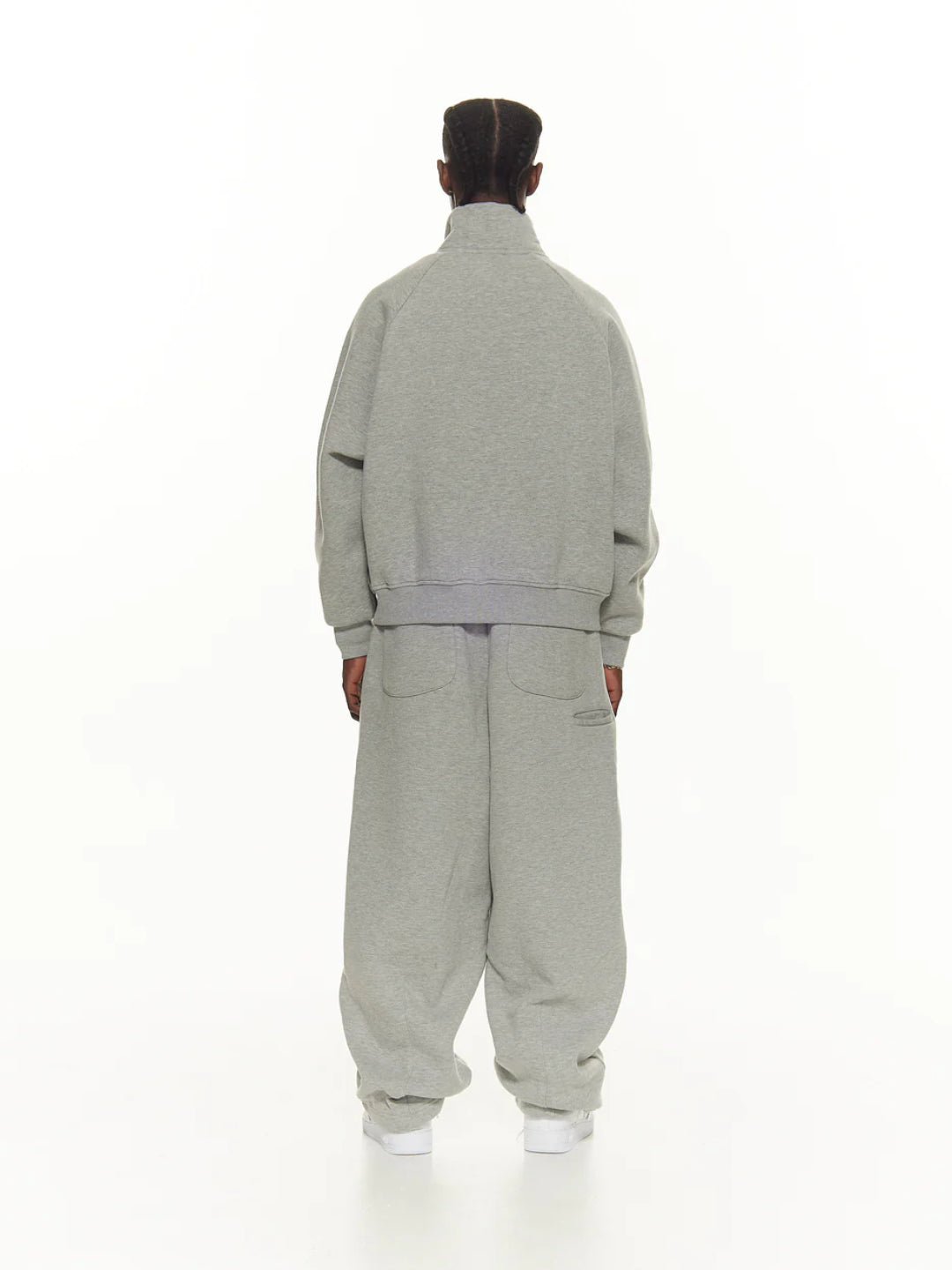 Grey tracksuit with a hoodie and pants.