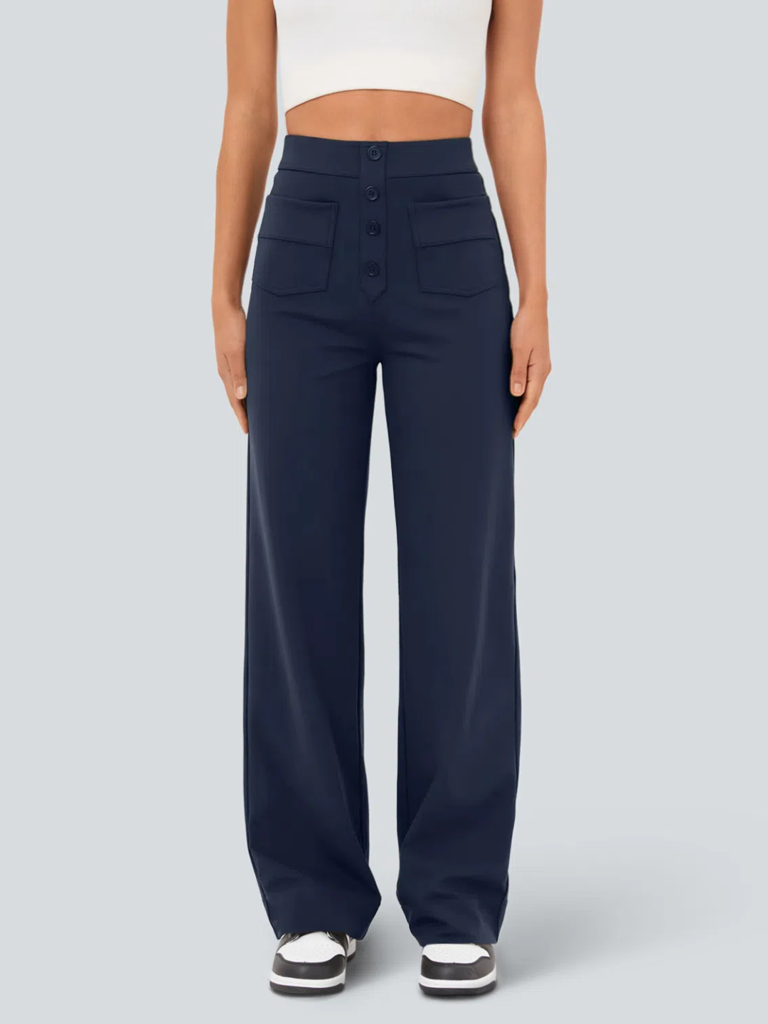 A person wearing high waisted button multiple pockets straight leg casual pants in navy color.