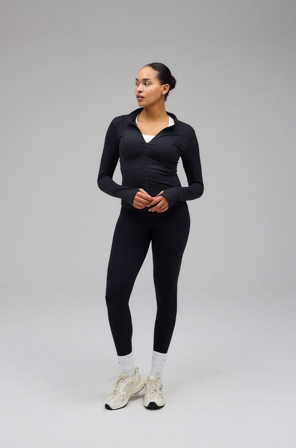 Black Hyper Zip Jacket with full sleeves, featuring a front zipper and a round neckline.