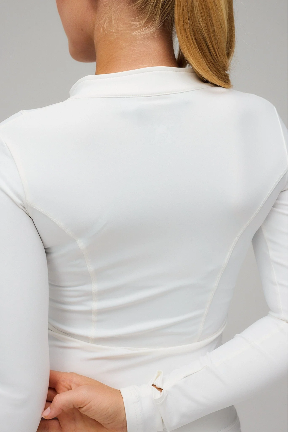 White Hyper Zip Jacket with full sleeves, featuring a front zipper and a round neckline.
