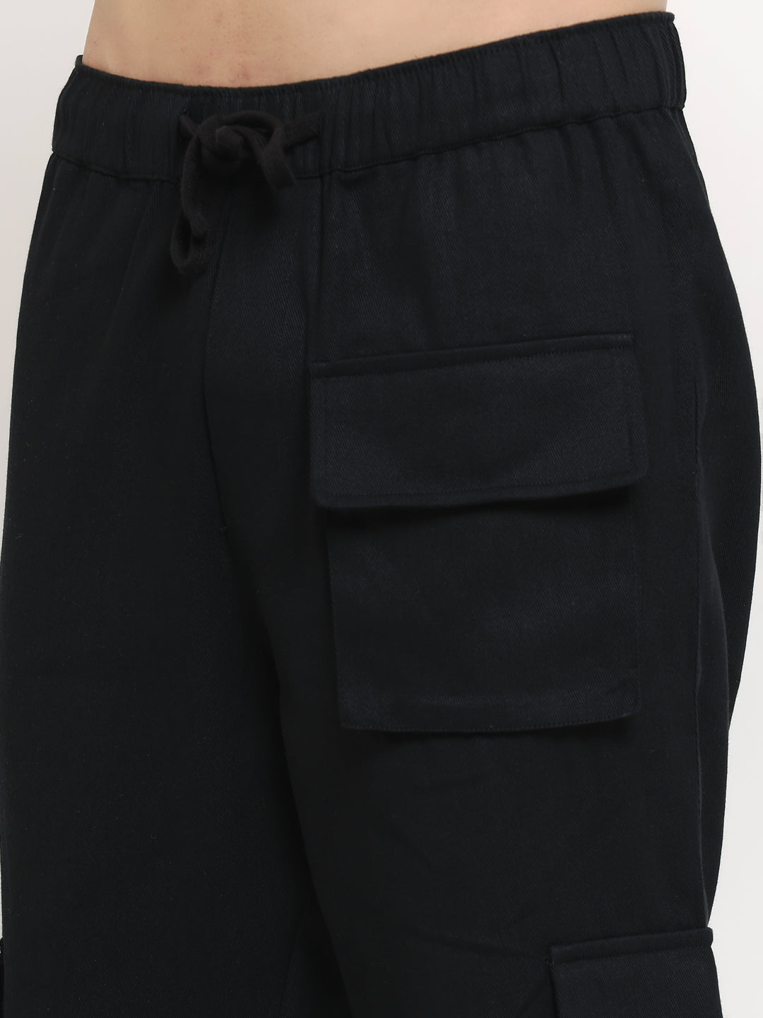 A black slim-fit cargo pants with multiple pockets, featuring an elasticated waistband with a drawstring.