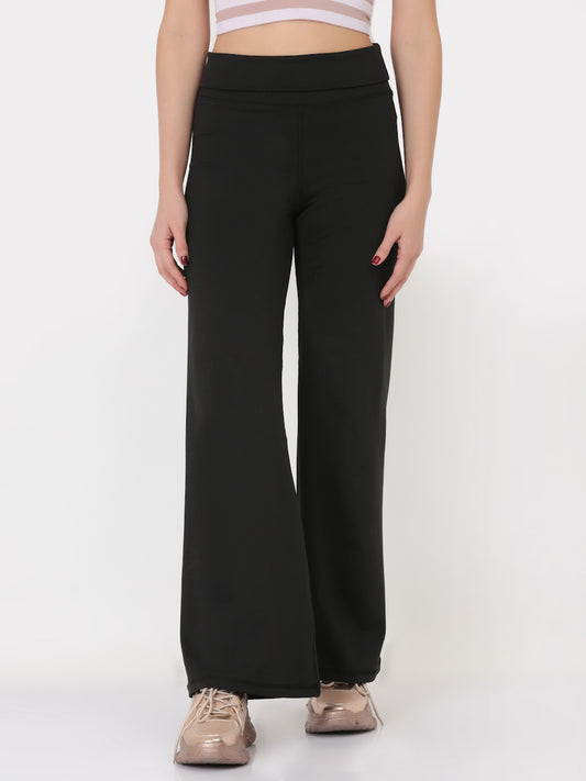 A pair of black ultra flare leggings featuring a foldover waistband, designed for comfort and style.