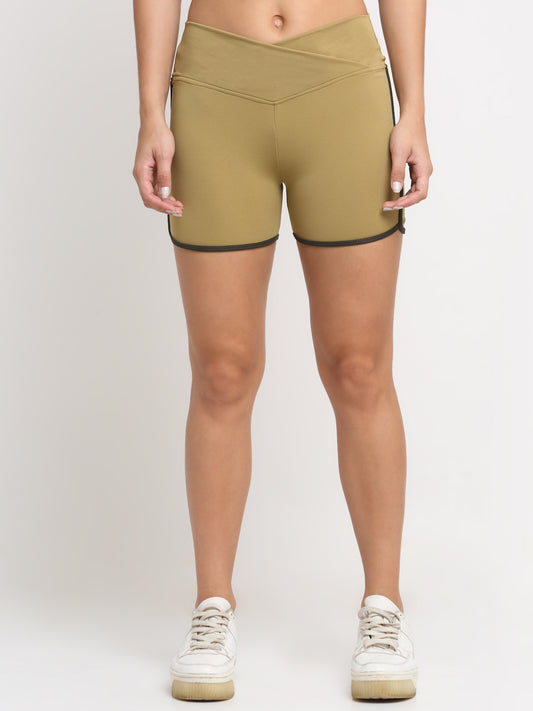 A pair of khaki active running shorts for women with contrasting piping on the sides.