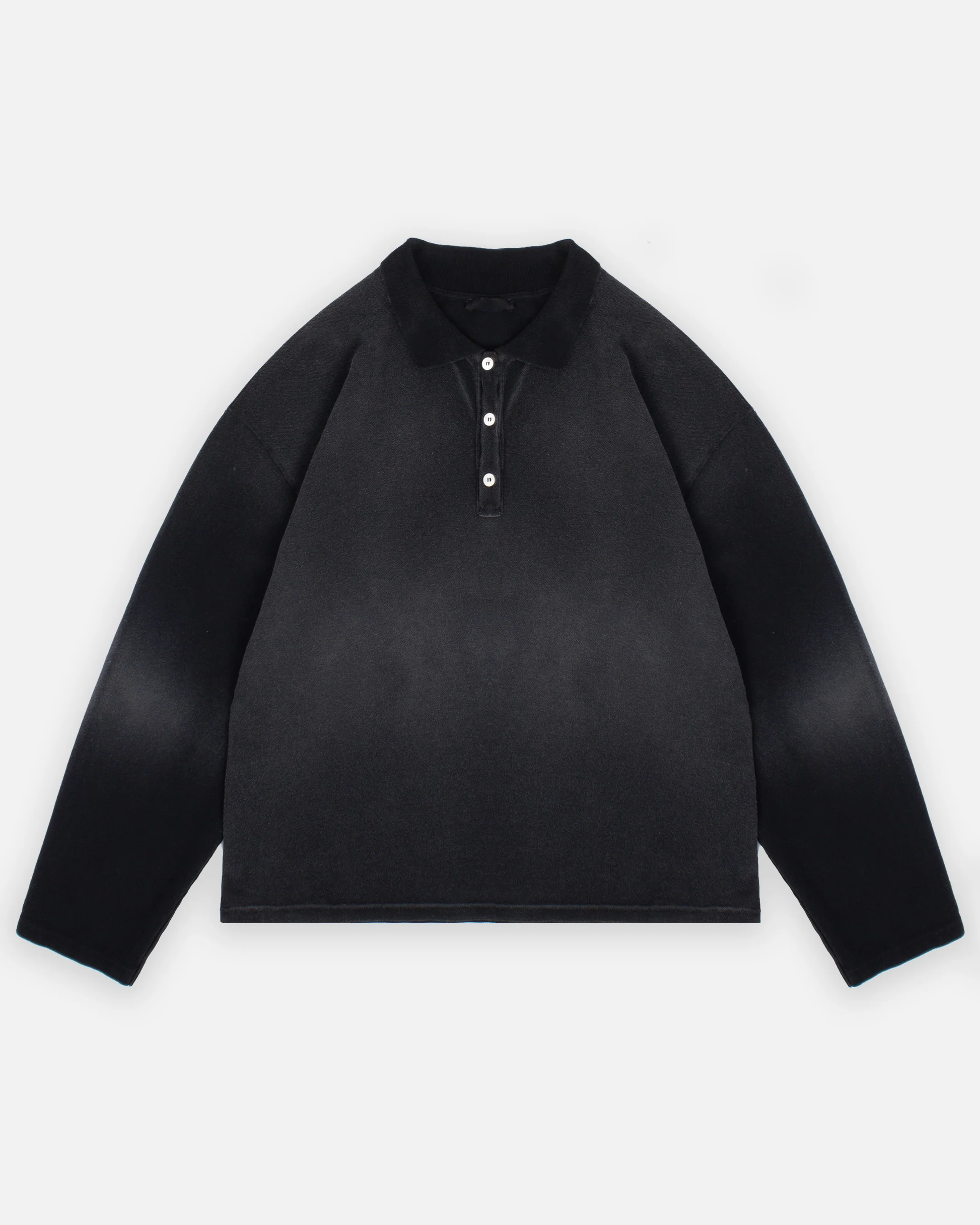 Black long-sleeve shirt on a light gray background