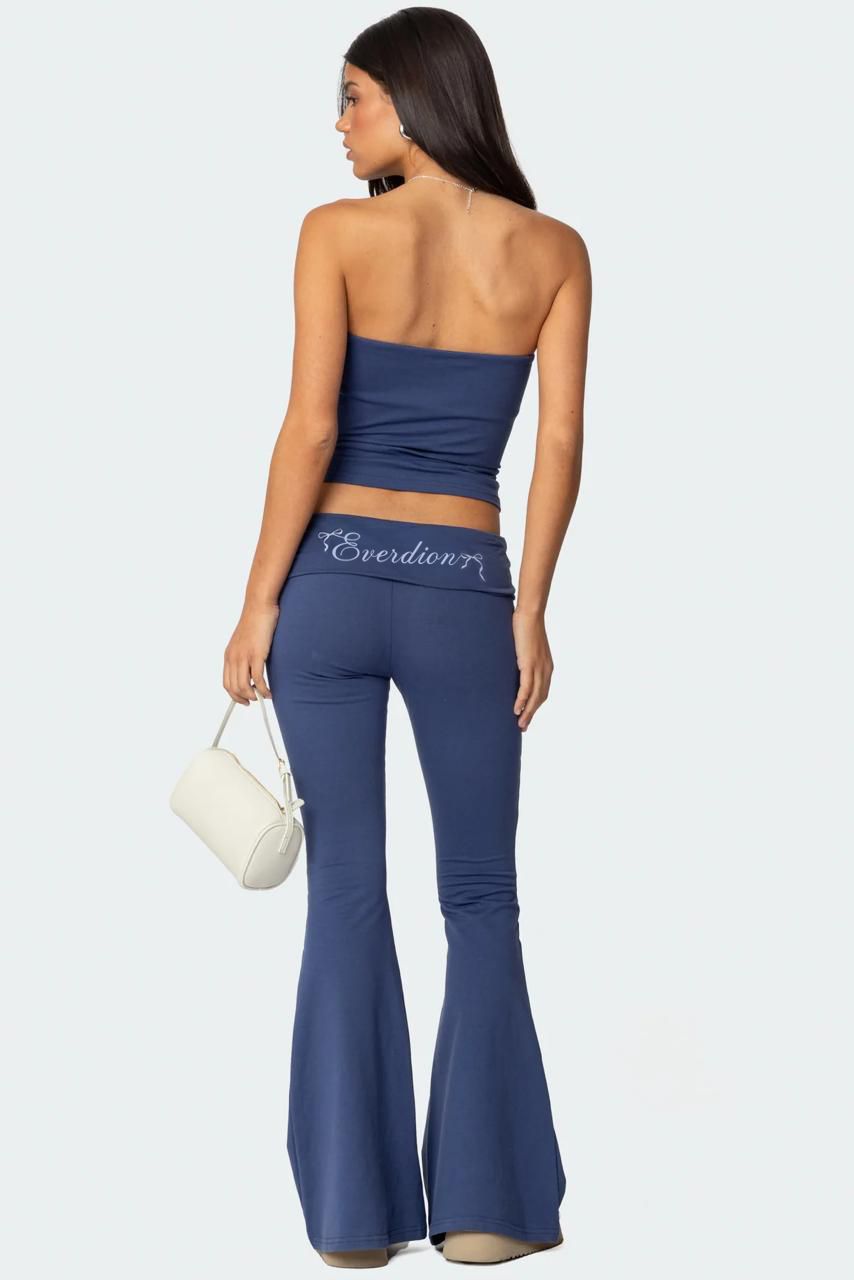 Back of a top and and pant in blue color