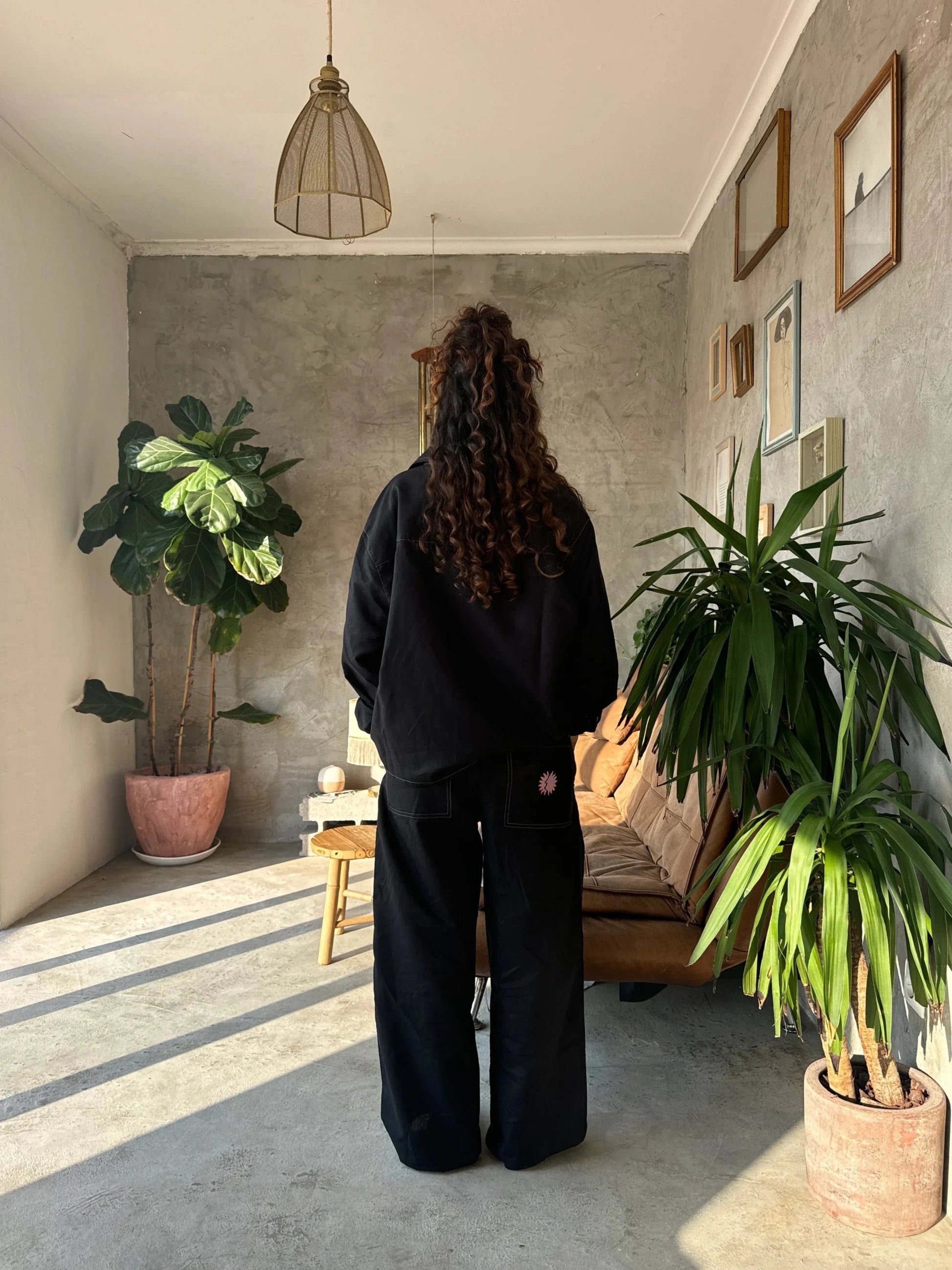 Relaxed fit Sol Linen Pants with a drawstring and pockets available in Dust, Mustard, Black, Indigo, and Pearl colors