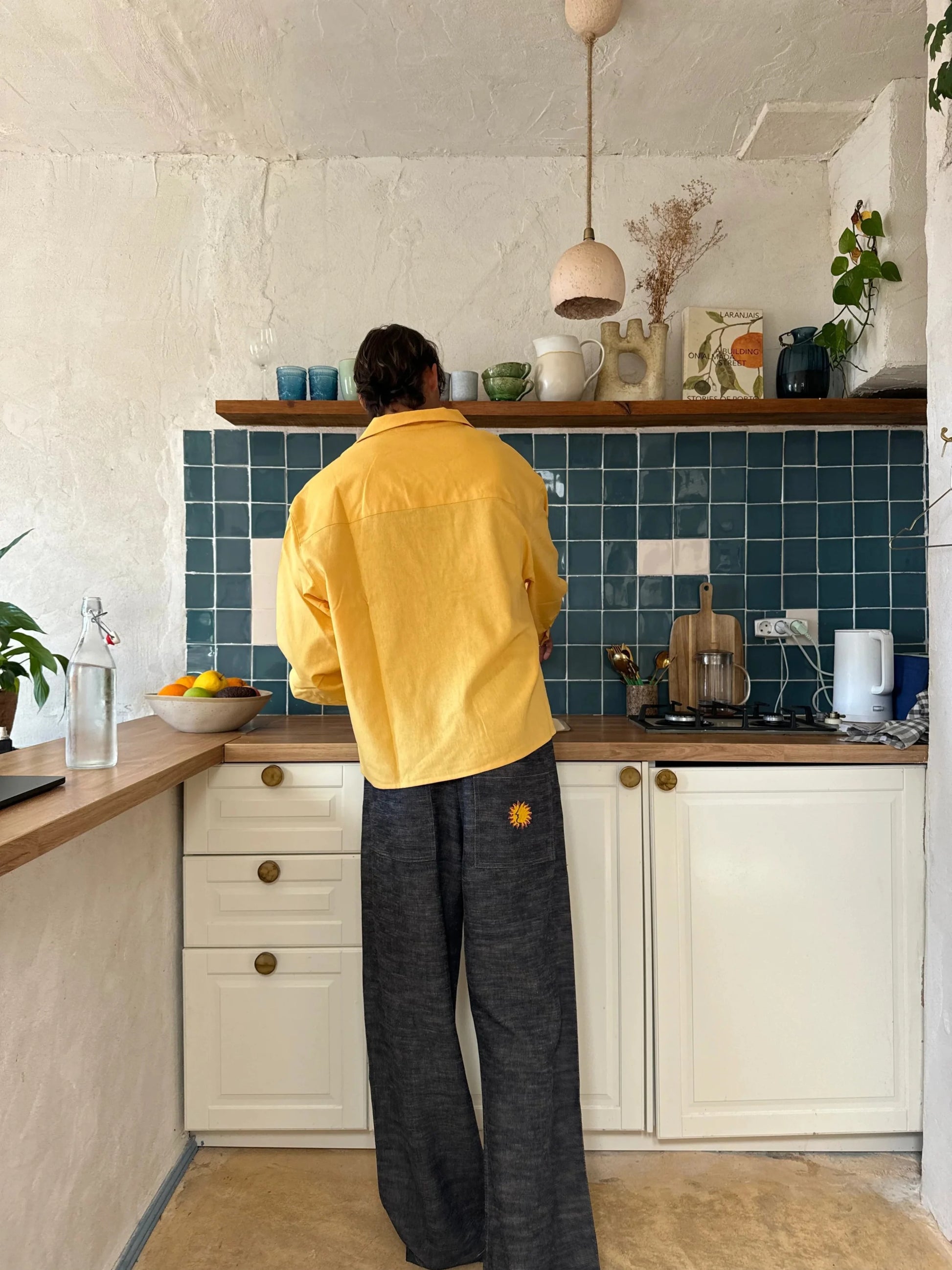 Relaxed fit Sol Linen Pants with a drawstring and pockets available in Dust, Mustard, Black, Indigo, and Pearl colors