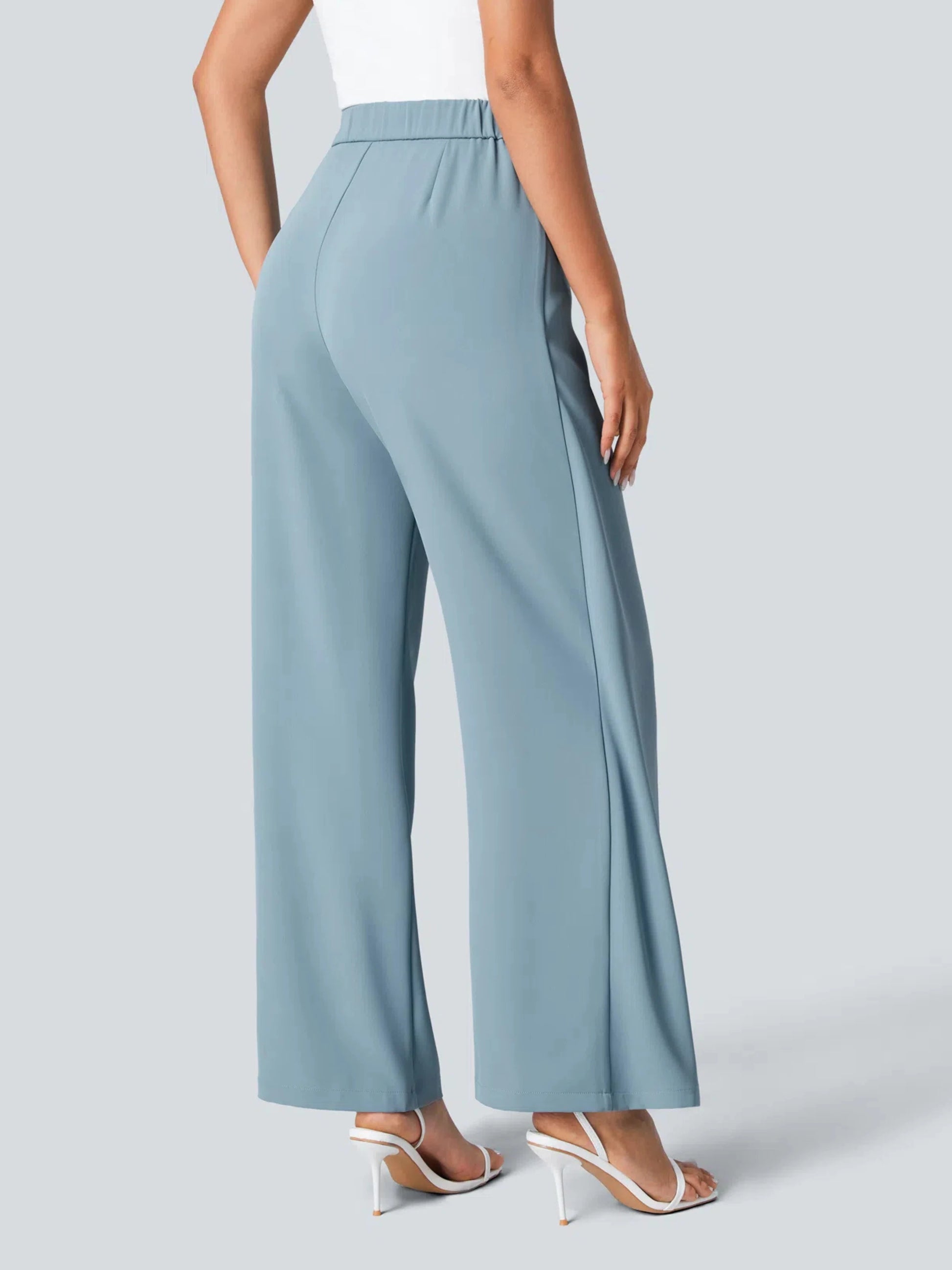 Light blue wide-leg pants worn by a person on a light gray background