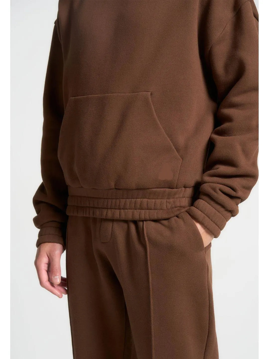 Brown tracksuit on a white background