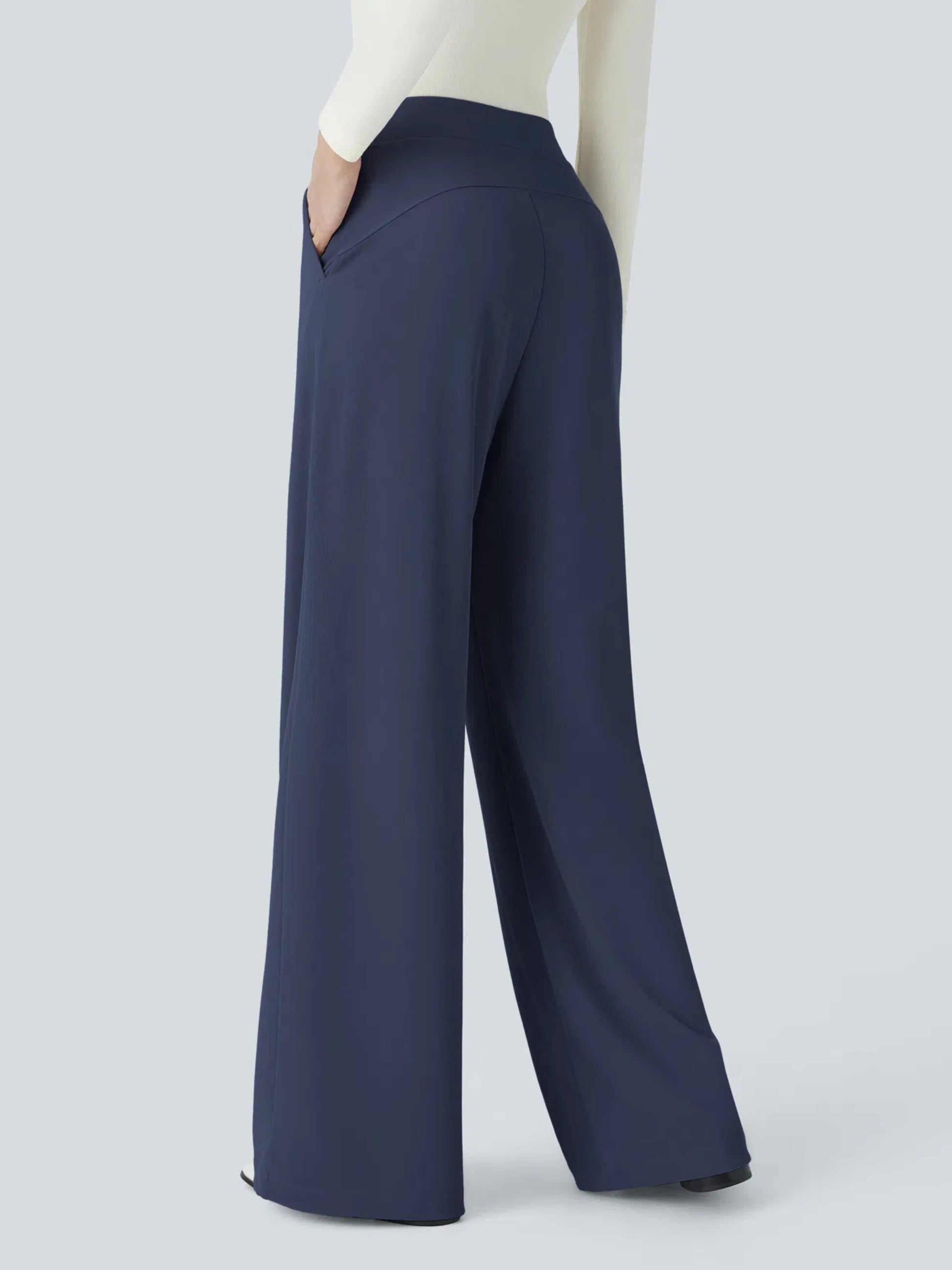 Navy wide-leg pants on a mannequin against a light gray background