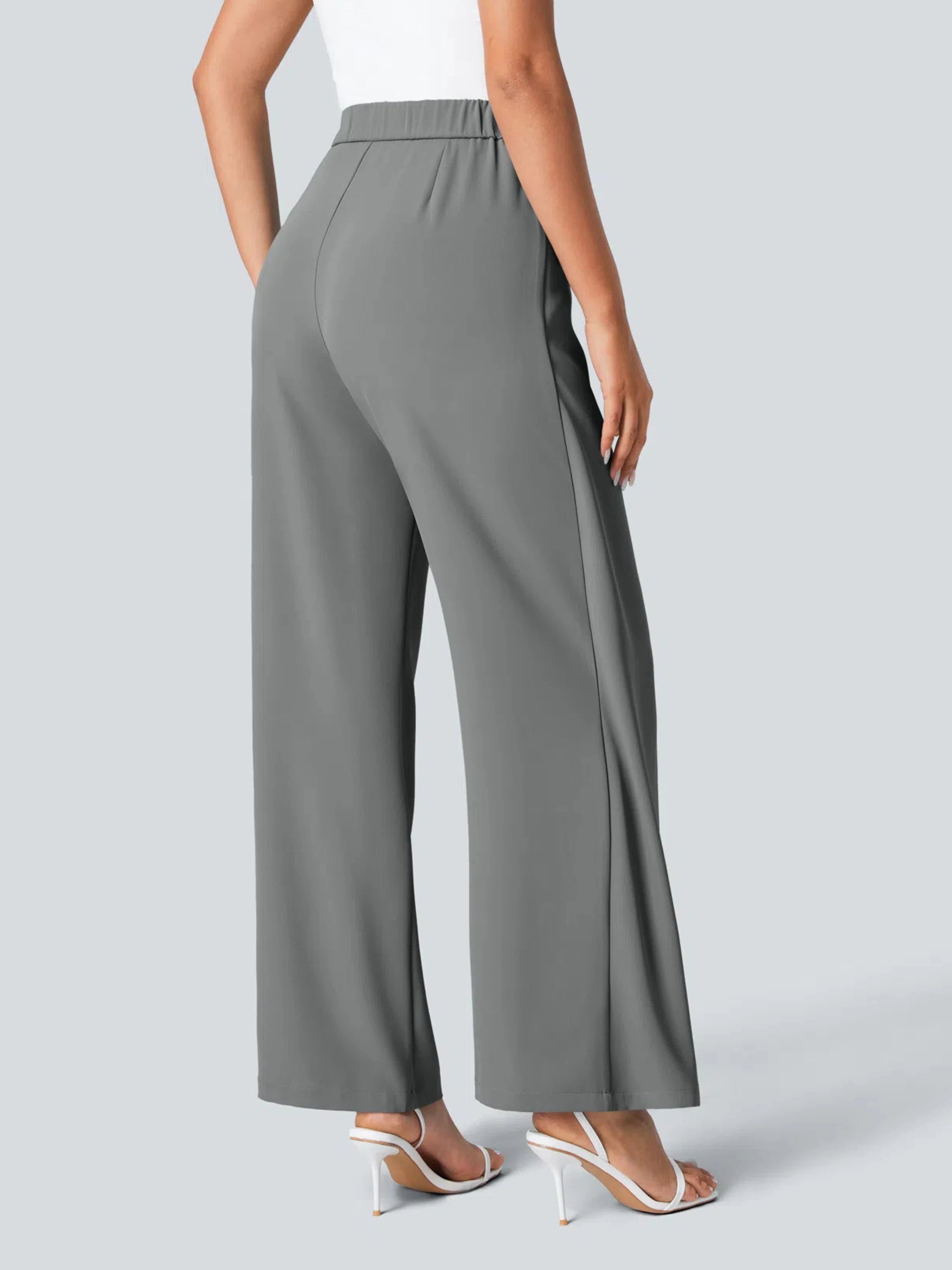 Gray wide-leg pants worn by a person on a light gray background