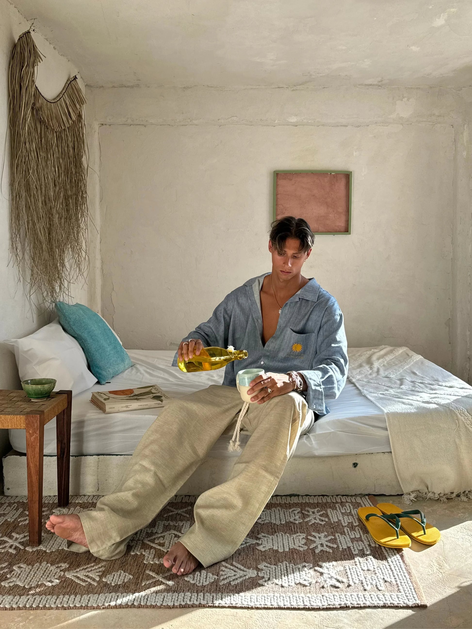 Relaxed fit Sol Linen Pants with a drawstring and pockets available in Dust, Mustard, Black, Indigo, and Pearl colors