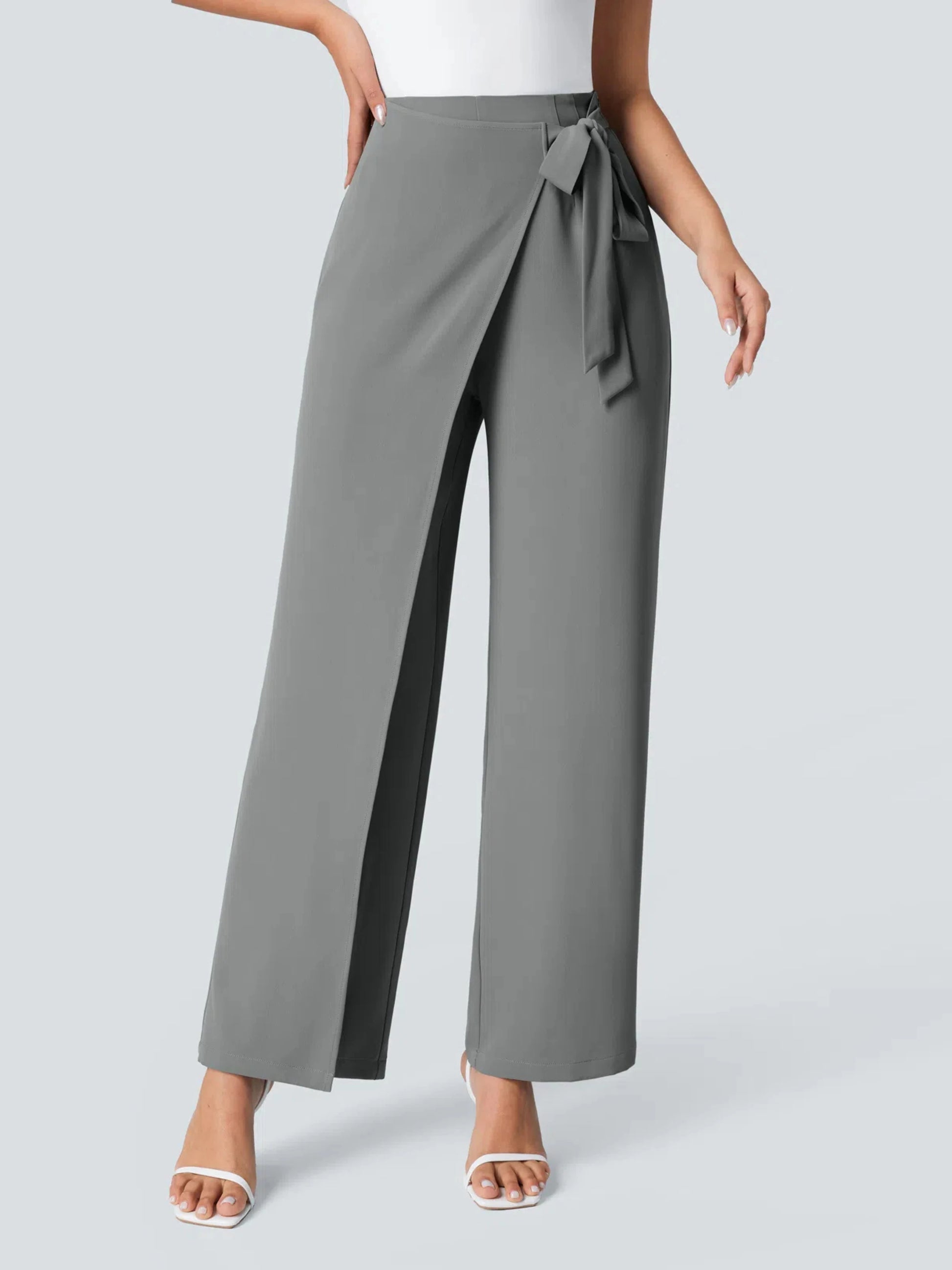 Gray wide-leg pants with a tie waist on a light gray background