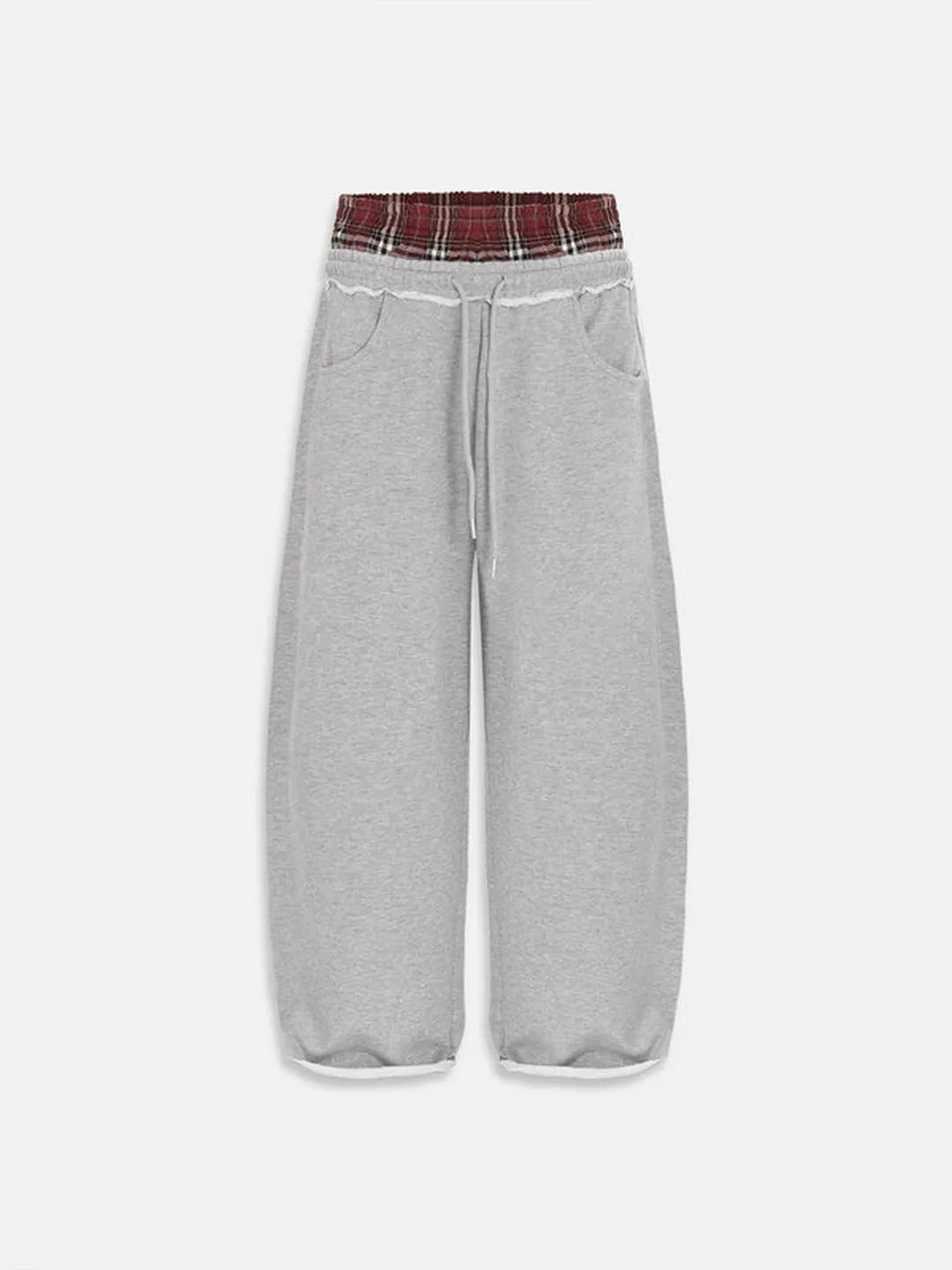 Grey sweatpants with a plaid waistband on a white background