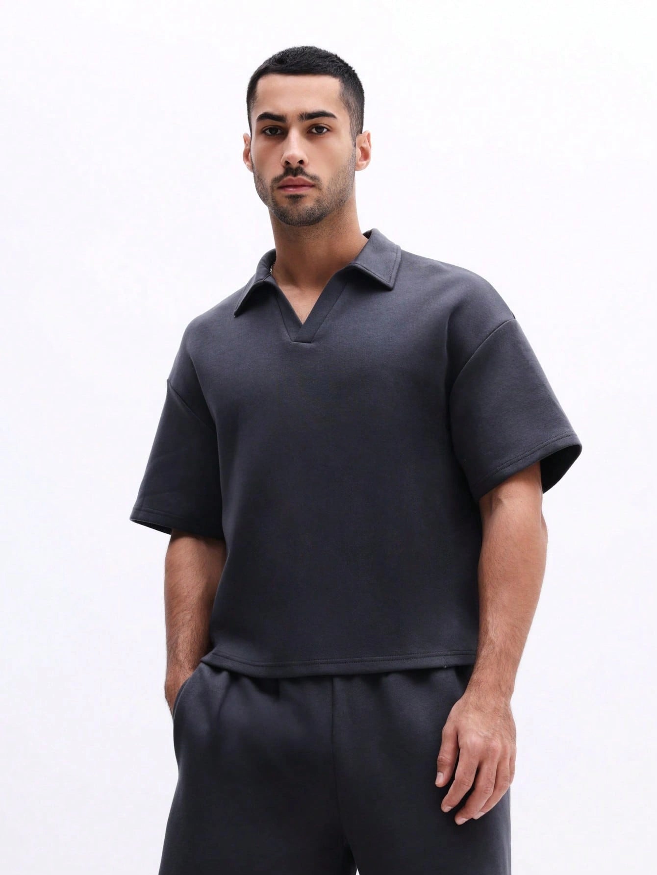 Man wearing Everdion's Collared Polo Top With Shorts Set in Navy color 
