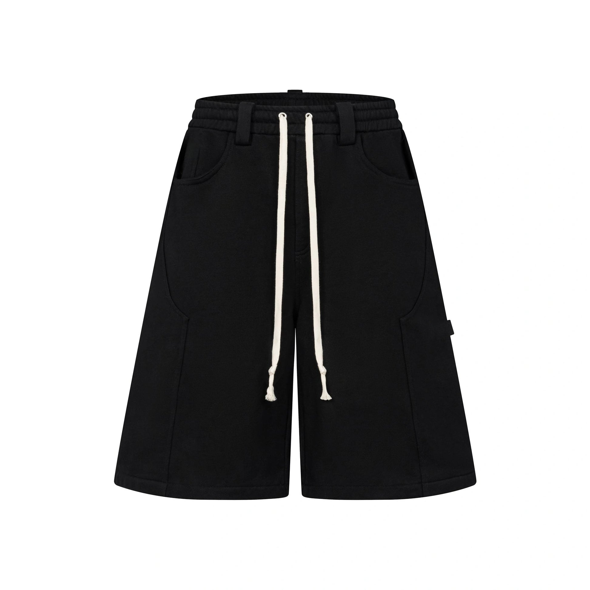 Oversized black carpenter shorts with elastic drawstring waist and wide-leg fit