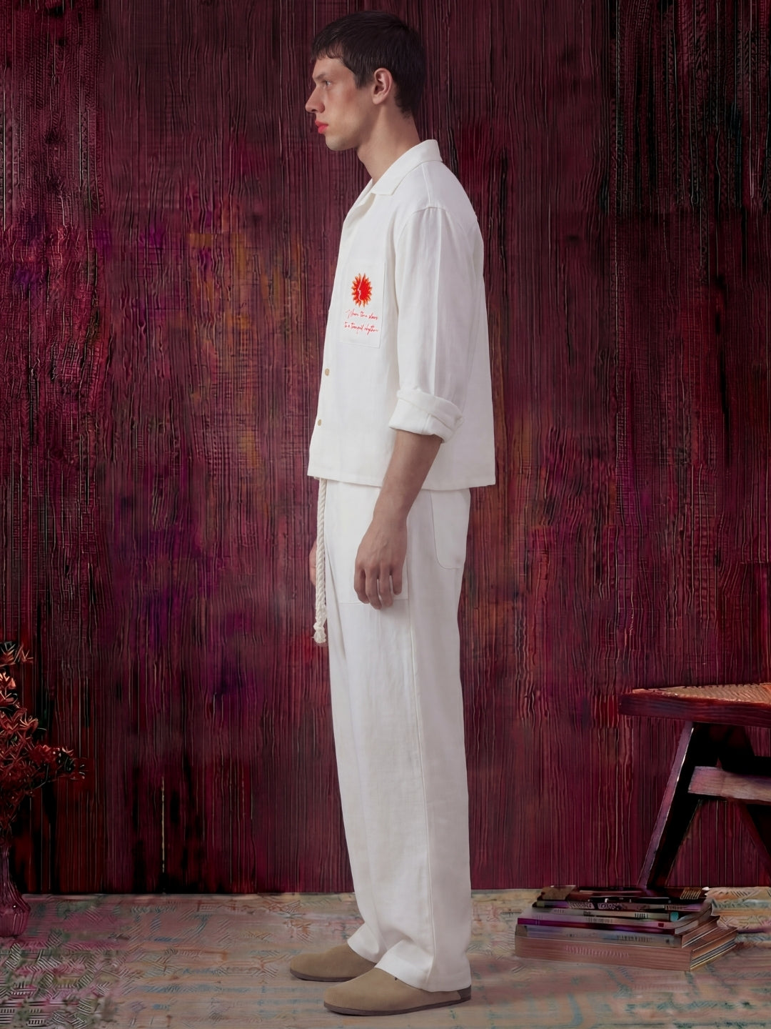 White linen shirt and pant outfit set, crafted from 100% breathable linen for effortless comfort. Pant with pockets and adjustable drawstring.