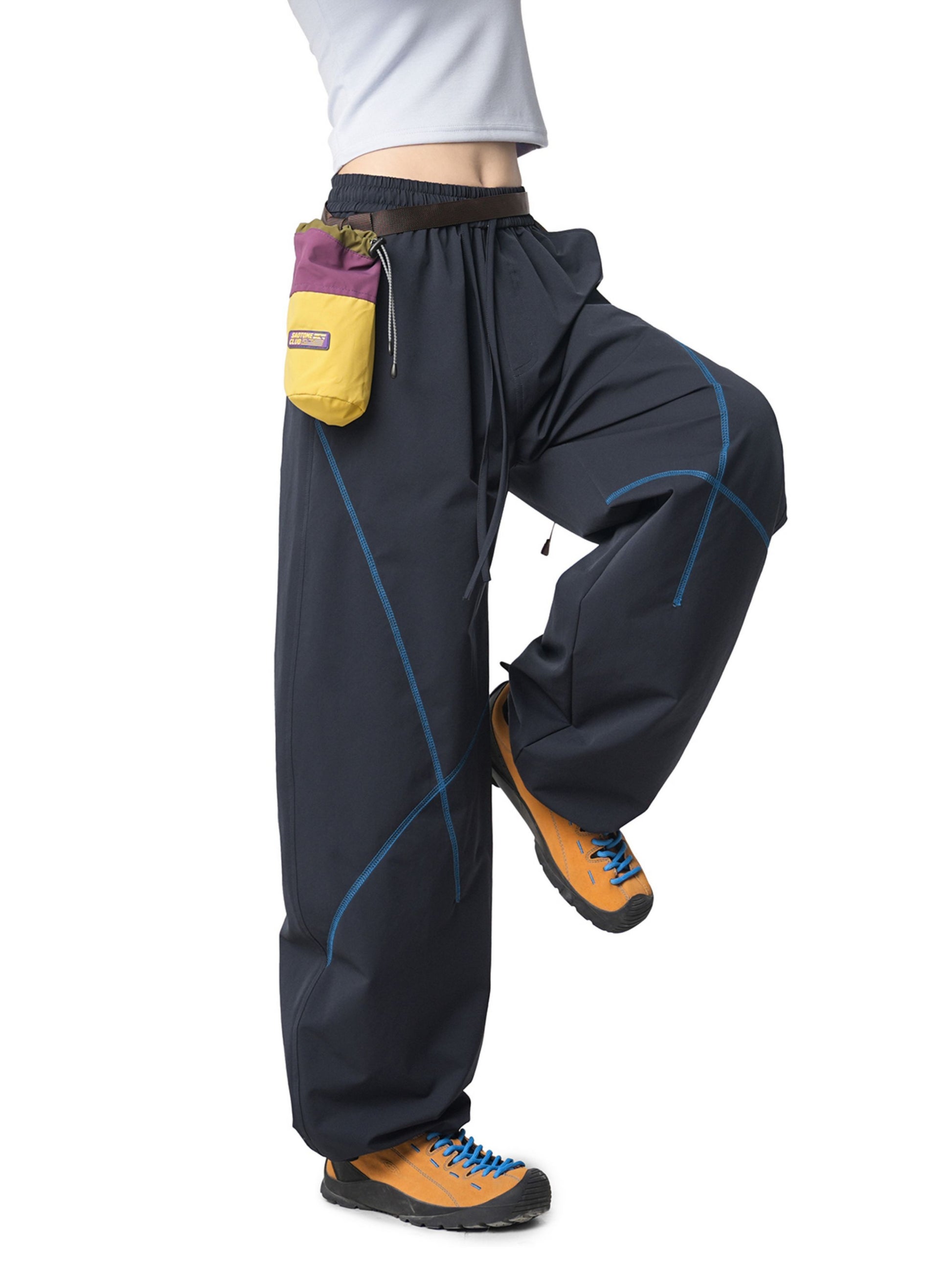 Navy Pants with Contrast stitching enhances the silhouette, adding subtle detail without compromising a clean look. Finished with practical pockets and a versatile design, these pants are ideal for casual outfits, travel, and athleisure wear.