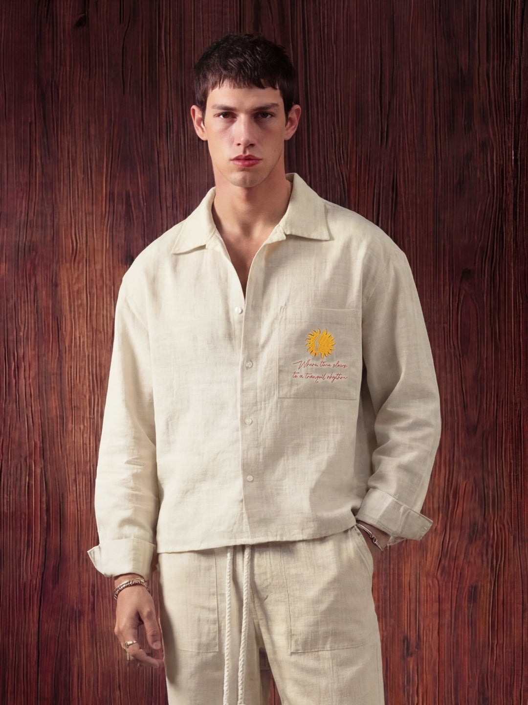 Beige linen shirt and pant outfit set, crafted from 100% breathable linen for effortless comfort. Pant with pockets and adjustable drawstring.