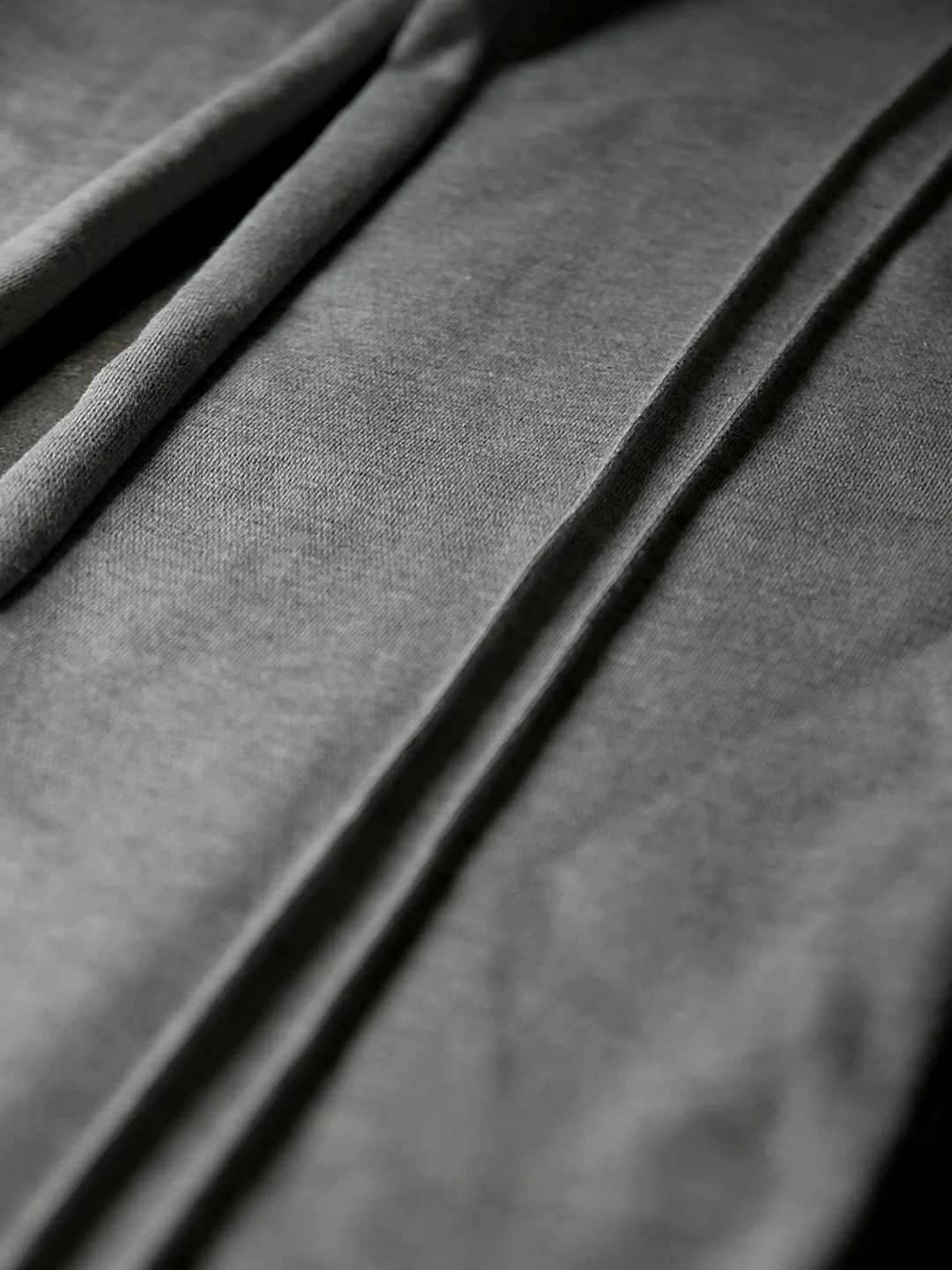 Close-up of gray fabric with folds