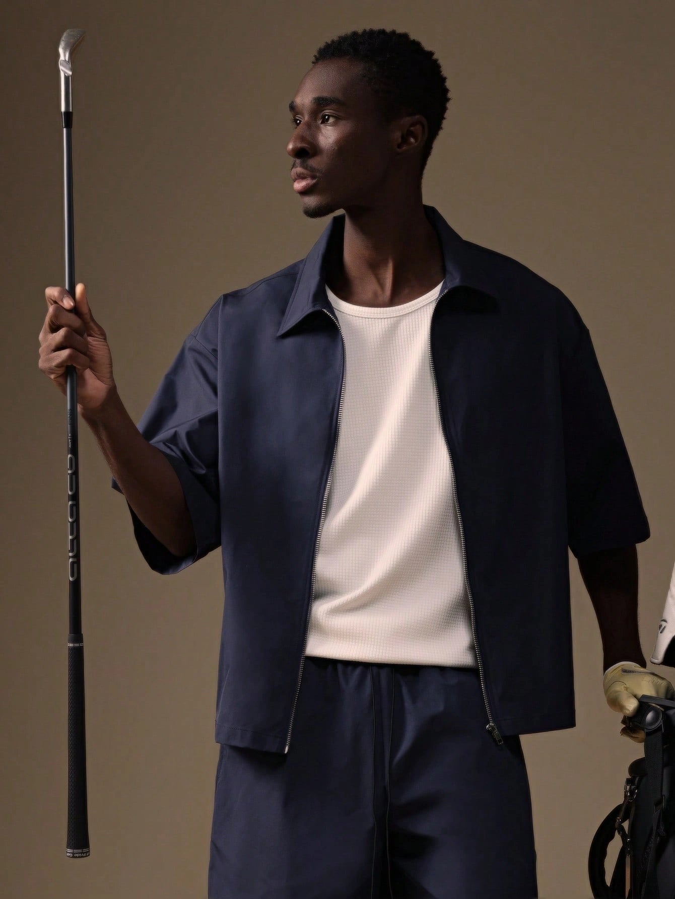 Model wearing the Auba Short Sleeve Shirt and Shorts Set in navy, matching outfit set