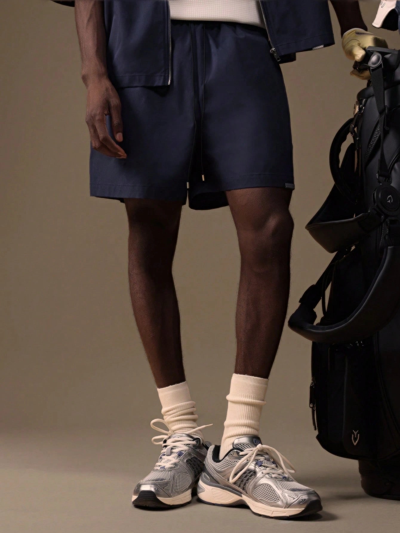 Model wearing the Auba Short Sleeve Shirt and Shorts Set in navy, matching outfit set