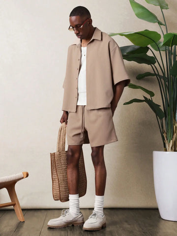 Man in beige shirt and shorts outfit set