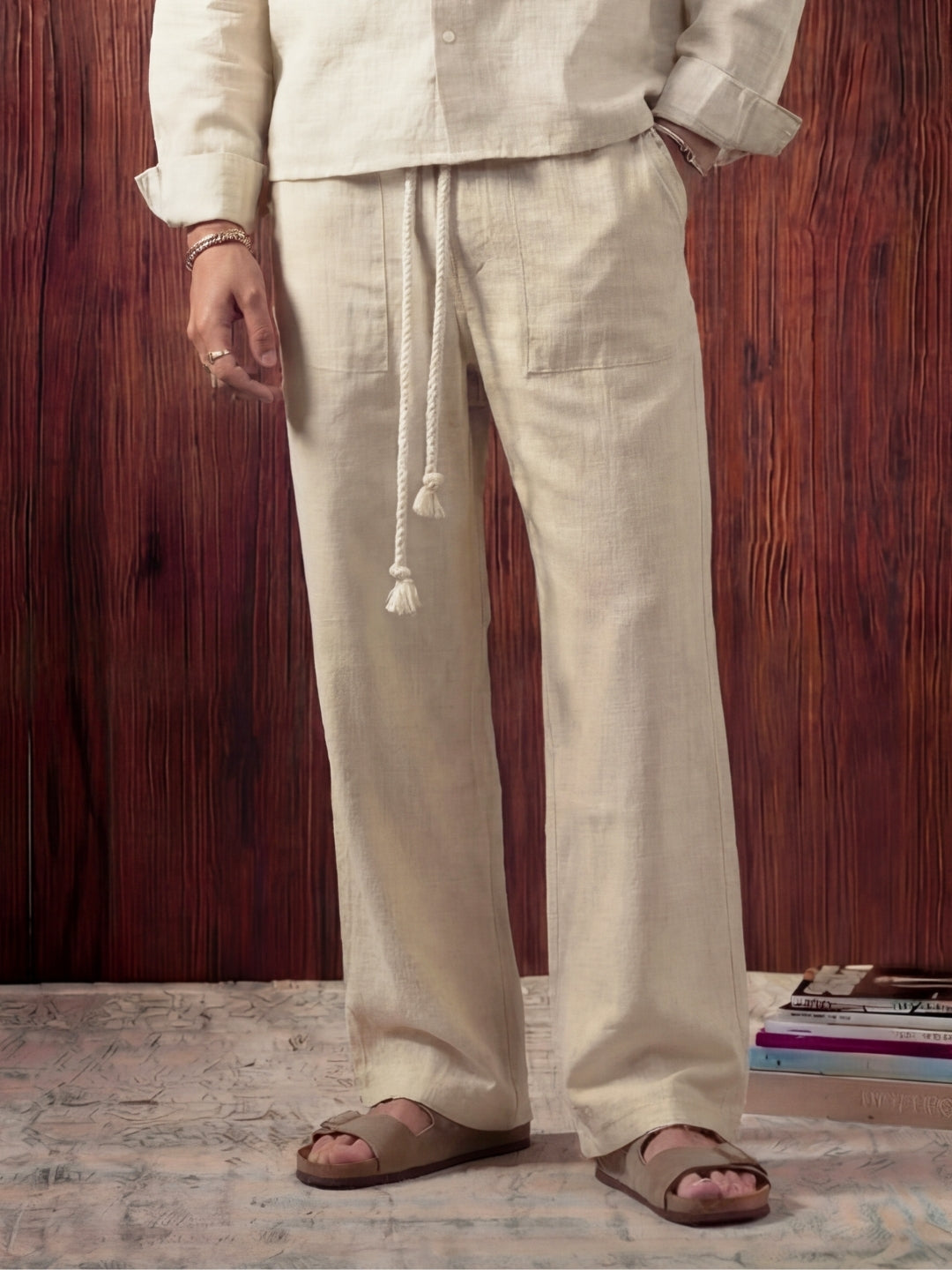 Beige linen shirt and pant outfit set, crafted from 100% breathable linen for effortless comfort. Pant with pockets and adjustable drawstring.