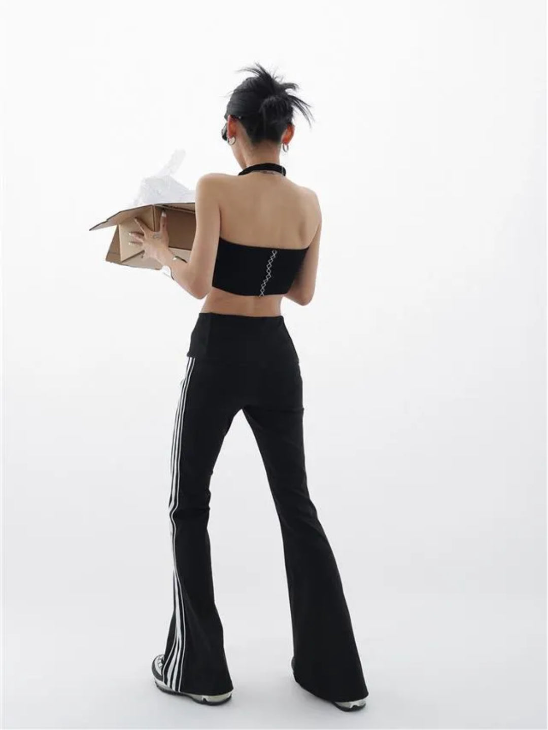 black flare leggings with white stripes on the side