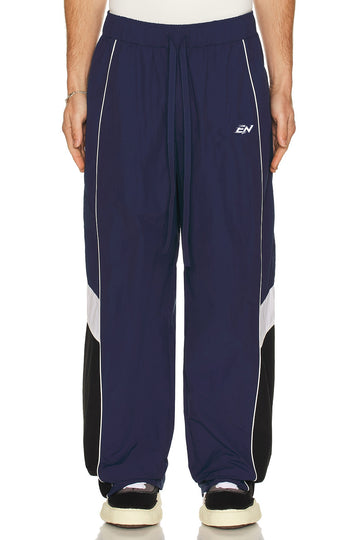 Navy blue pants with white and black accents on a white background
