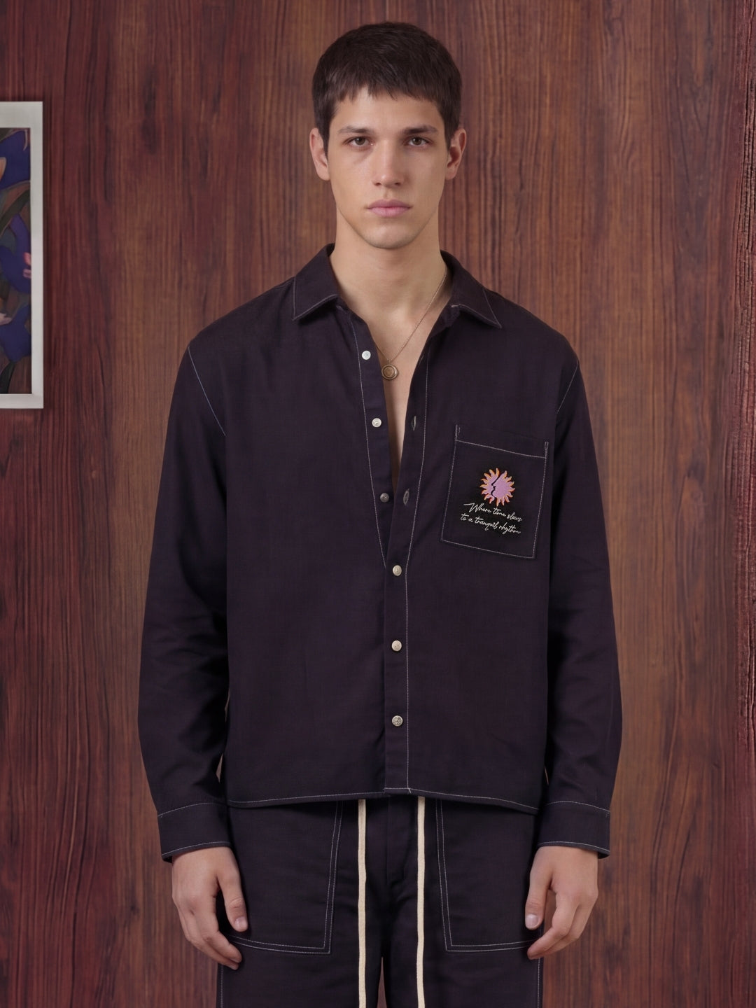 Black linen shirt and pant outfit set, crafted from 100% breathable linen for effortless comfort. Pant with pockets and adjustable drawstring.