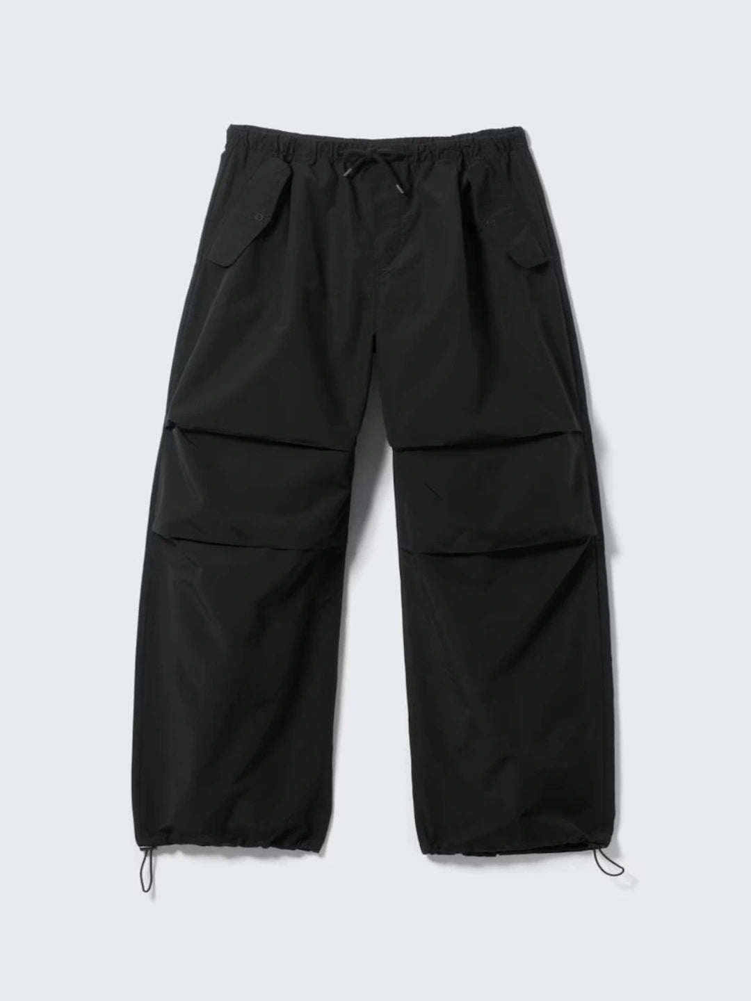 Black cargo pants on a light gray background