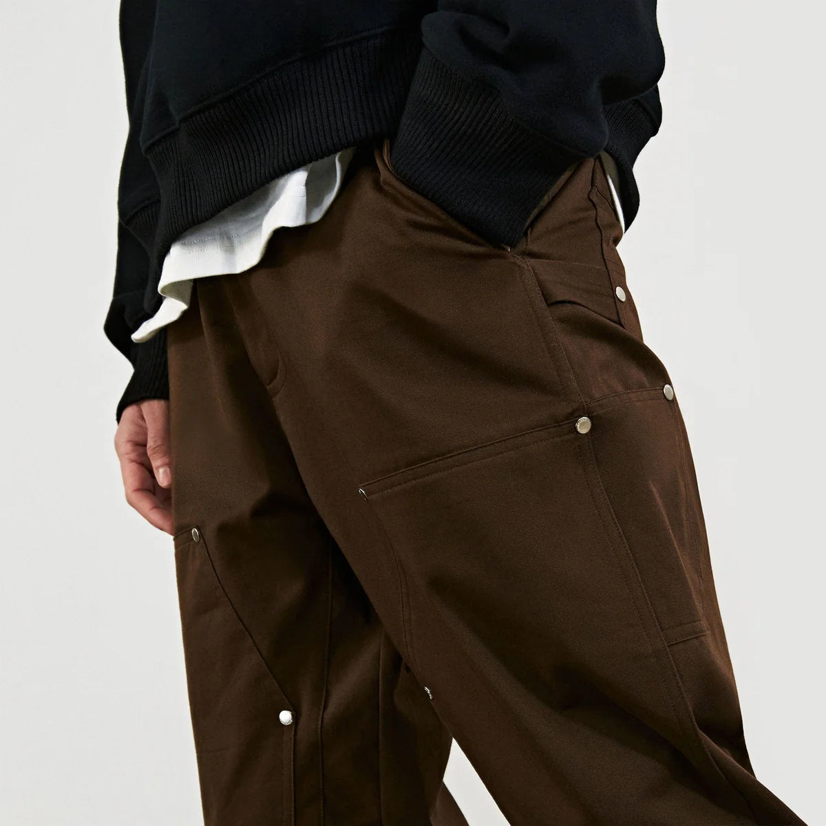 brown cotton rivet cargo pants for men relaxed fit close look