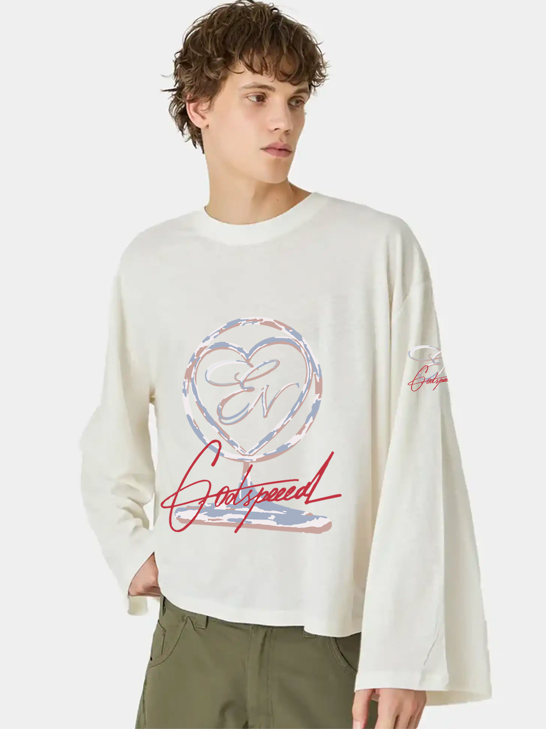 Person wearing a white sweatshirt with a graphic design on a white background