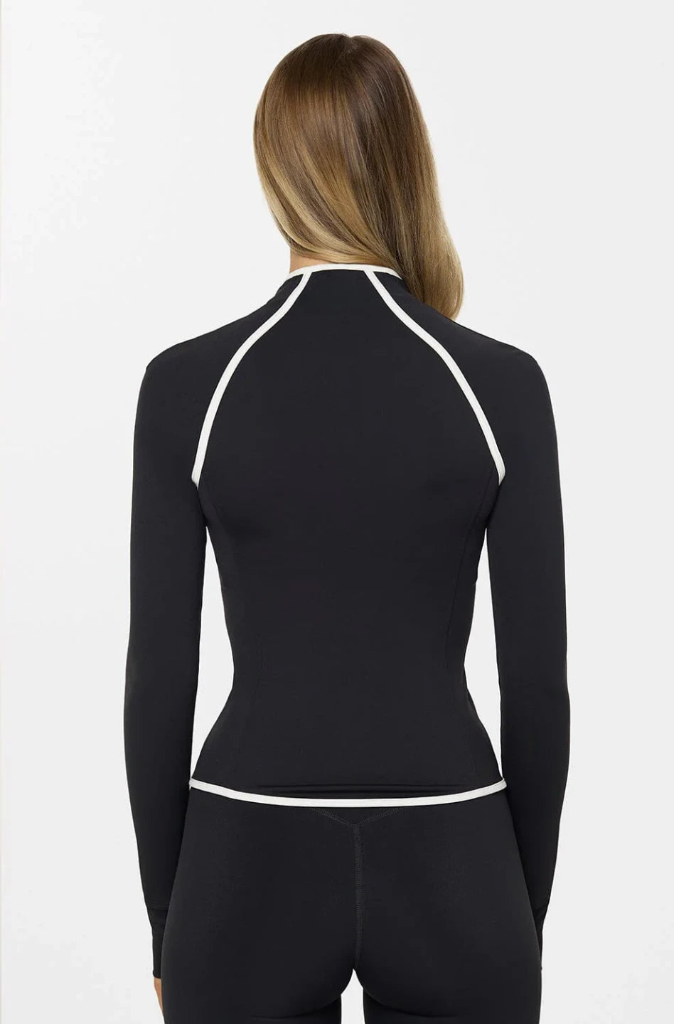 Black long-sleeve athletic top with white accents on a white background