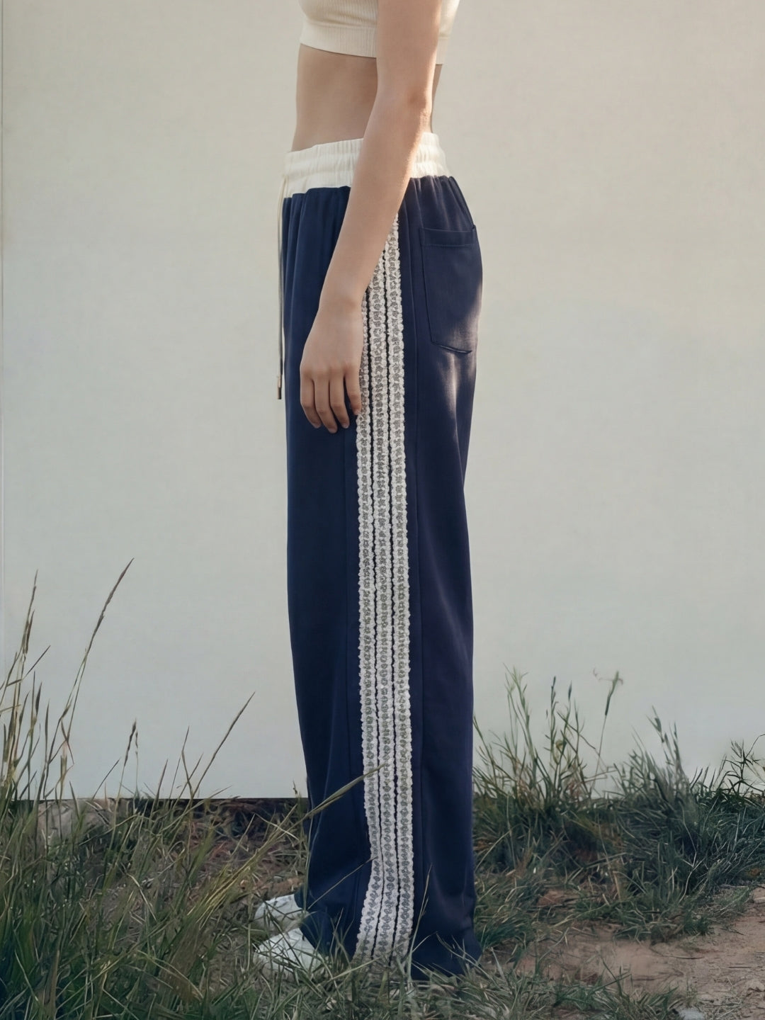 Navy Sweat Pants with adjustable drawstrings and white strips 