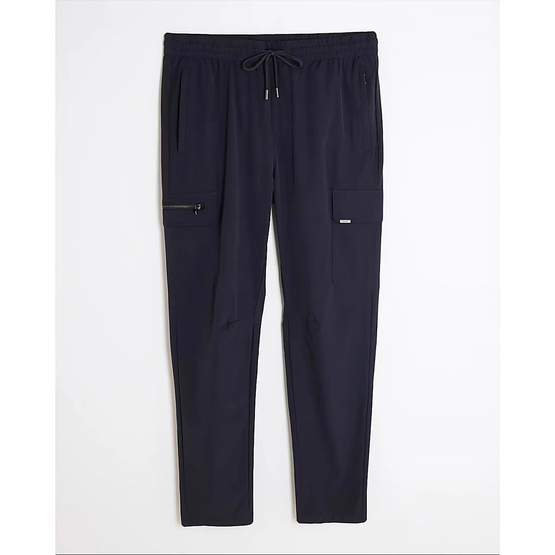 Navy blue pants with zippers and pockets on a white background