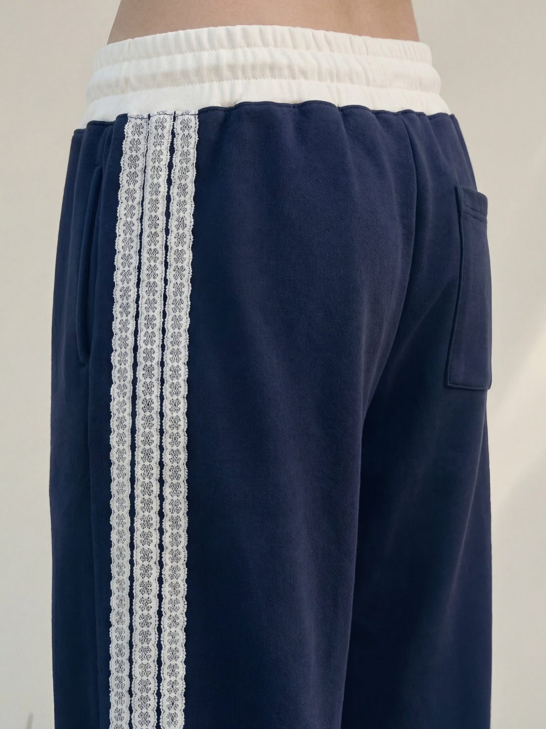 Navy Sweat Pants with adjustable drawstrings and white strips 