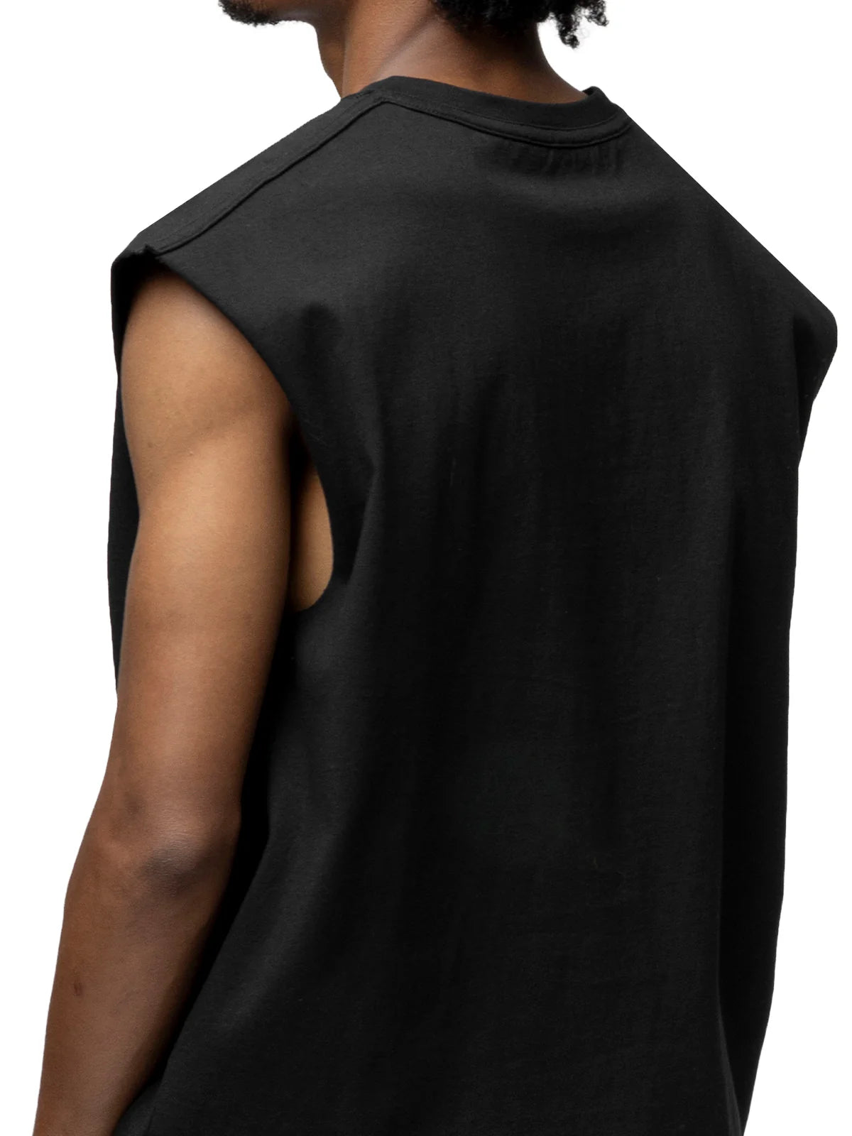Black sleeveless shirt worn by a person on a white background