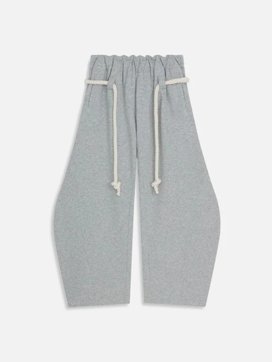 A male model wearing gray baggy barrel sweatpants with a wide-leg fit and elasticized waistband, featuring a rope drawstring.