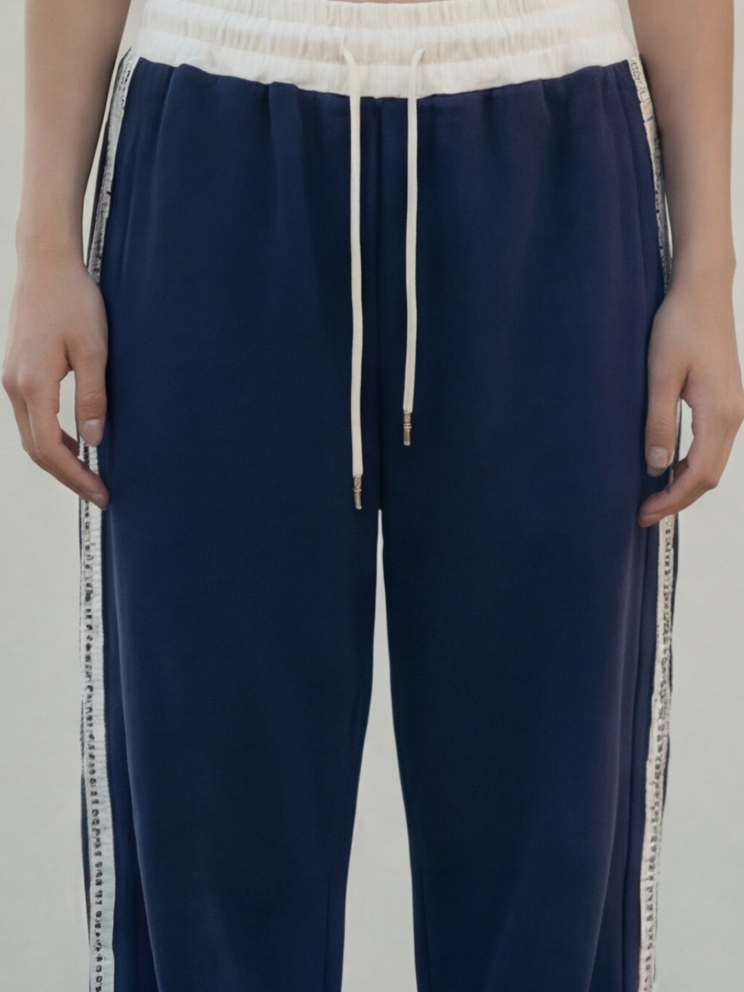 Navy Sweat Pants with adjustable drawstrings and white strips 